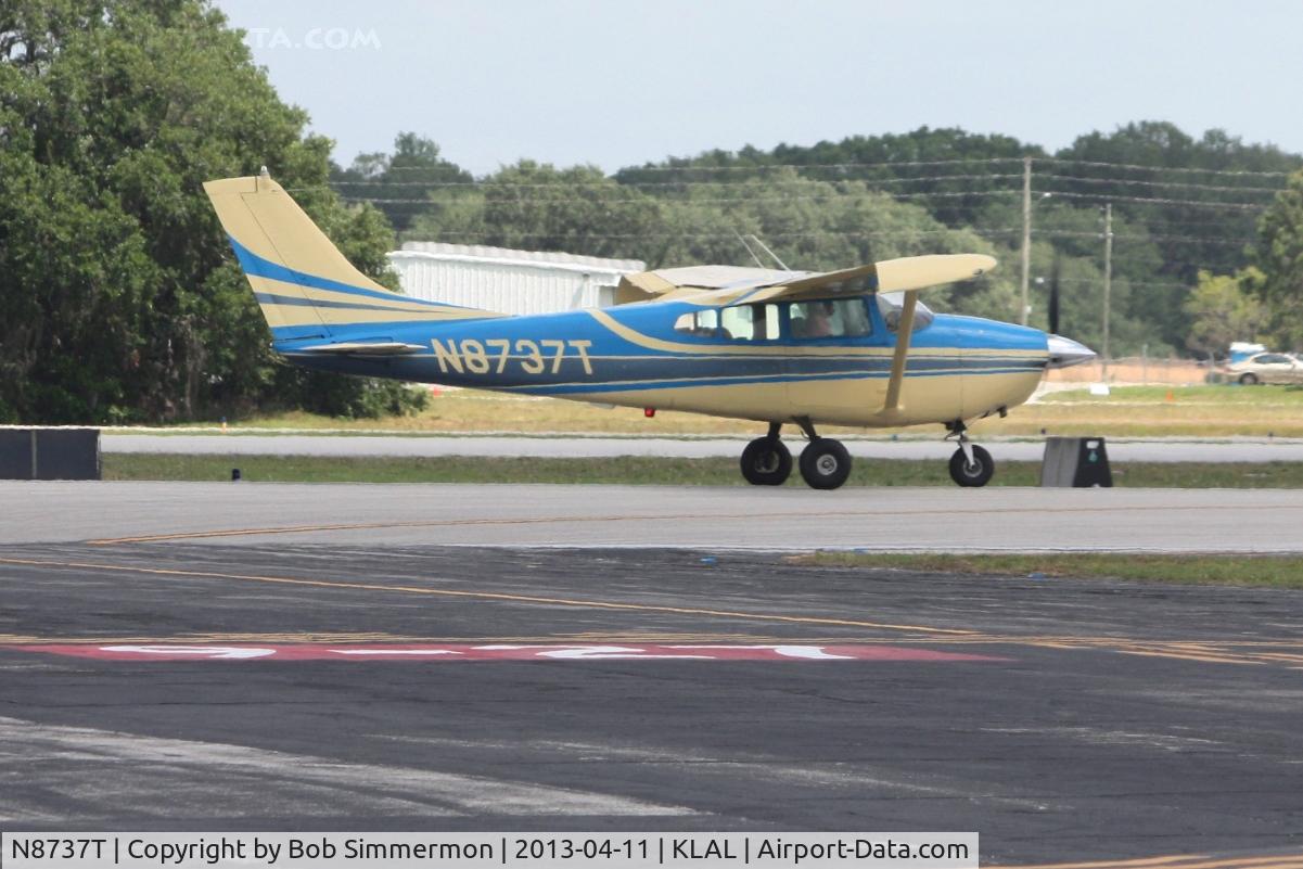 N8737T, 1960 Cessna 182C Skylane C/N 52637, Departing Lakeland, FL - Sun N Fun 2013.