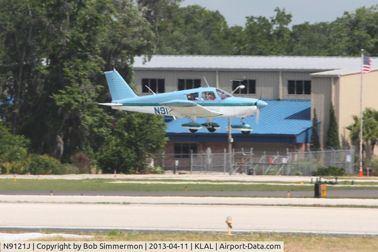 N9121J, 1966 Piper PA-28-180 C/N 28-3168, Arriving at Lakeland, FL during Sun N Fun 2013