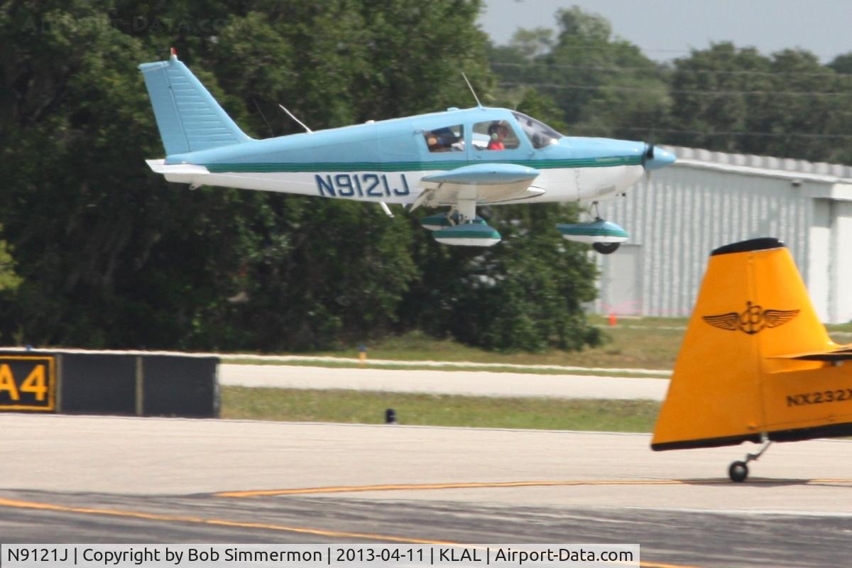 N9121J, 1966 Piper PA-28-180 C/N 28-3168, Arriving at Lakeland, FL during Sun N Fun 2013