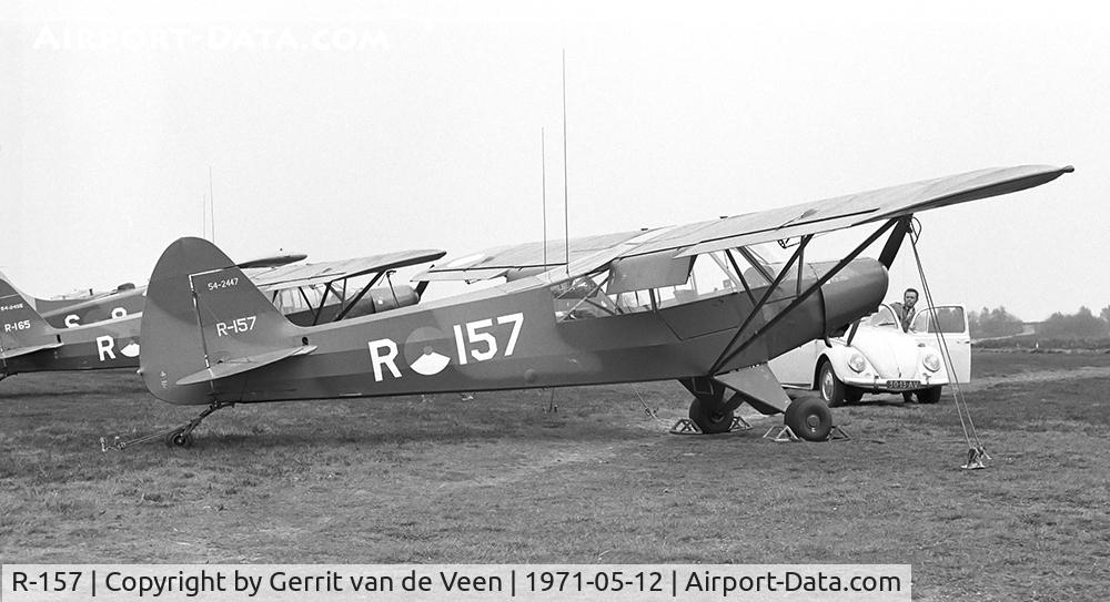 R-157, 1954 Piper L-21B Super Cub (PA-18-135) C/N 18-3847, The 54-2447 with many other L21's and Beaver S-8 'on the flightline' at Ermelo LAS
