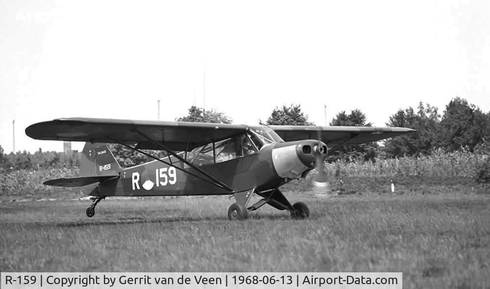 R-159, 1954 Piper L-21B Super Cub (PA-18-135) C/N 18-3849, this dayglow nosed 54-2449 takes off 'runway 09' Ermelo LAS