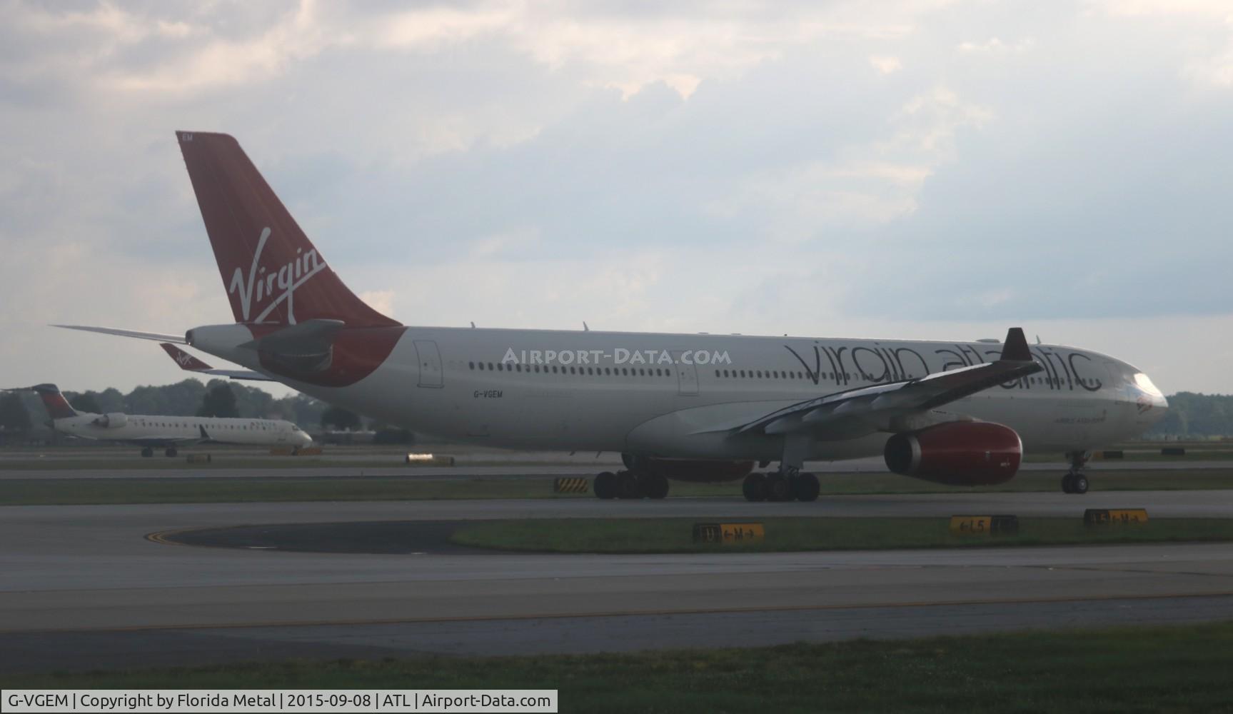 G-VGEM, 2011 Airbus A330-343X C/N 1215, Virgin Atlantic taken from window of Southwest 737