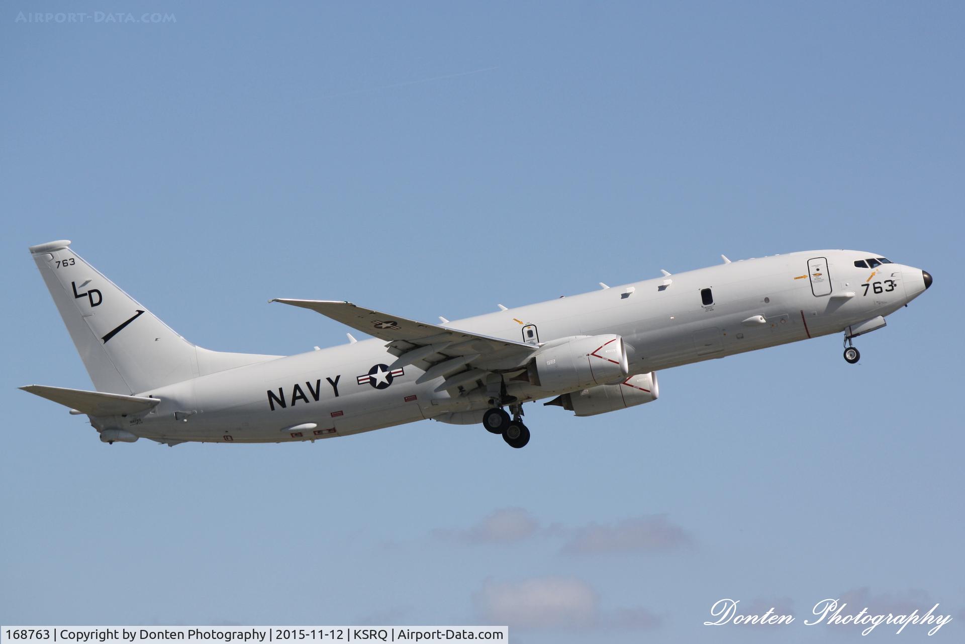 168763, 2014 Boeing P-8A Poseidon C/N 42259, US Navy P-8 Poseidon (168763) from NAS Jacksonville departs Sarasota-Bradenton International Airport