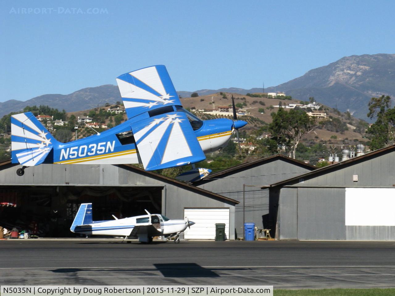 N5035N, 1978 Bellanca 8KCAB Decathlon C/N 470-79, 1978 Bellanca 8KCAB DECATHLON, Lycoming AEIO-320 150 Hp, takeoff climb Rwy 04 in gusty wind