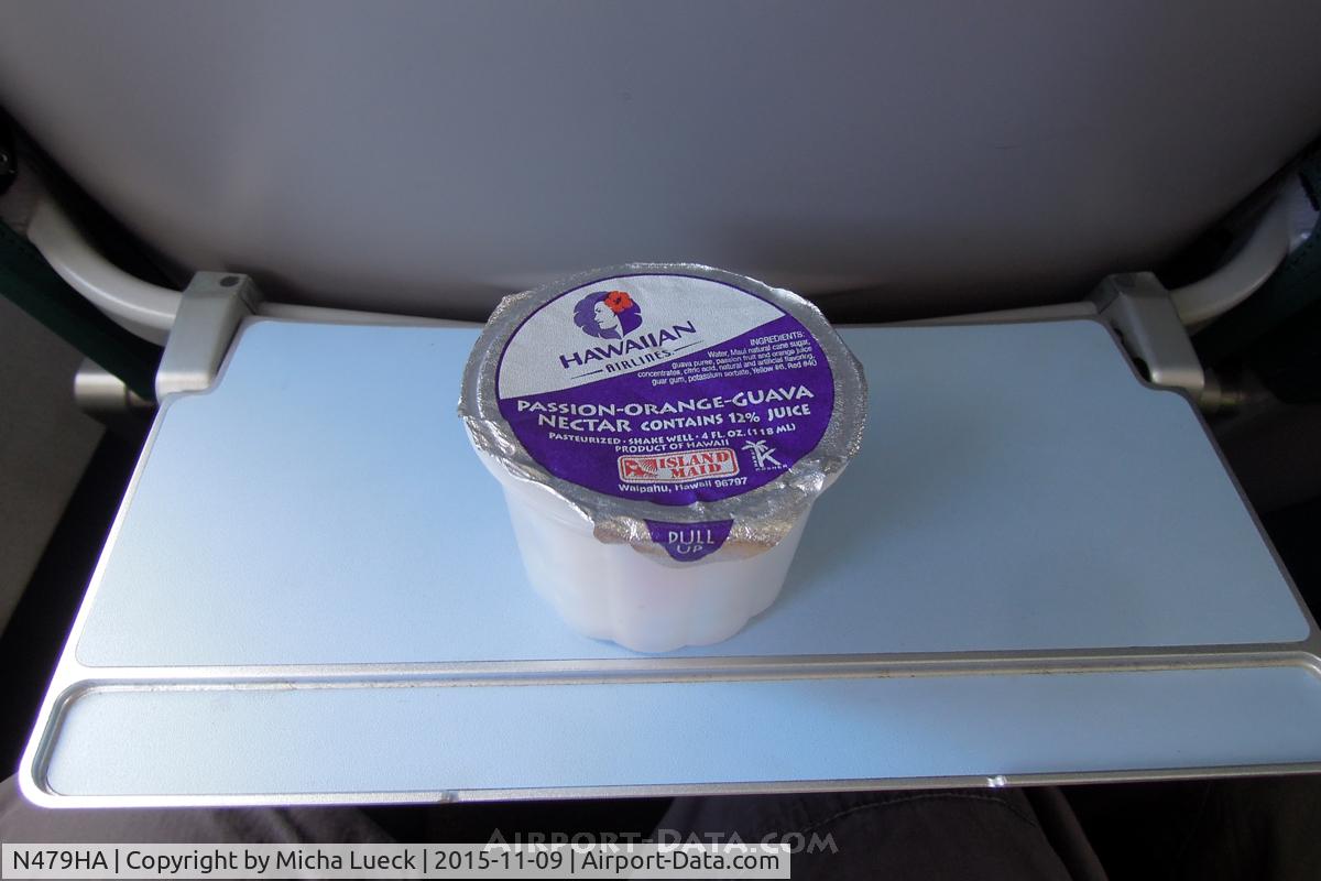N479HA, 2001 Boeing 717-22A C/N 55124, The tiniest tray table I have seen on a jet... (HNL-KOA)