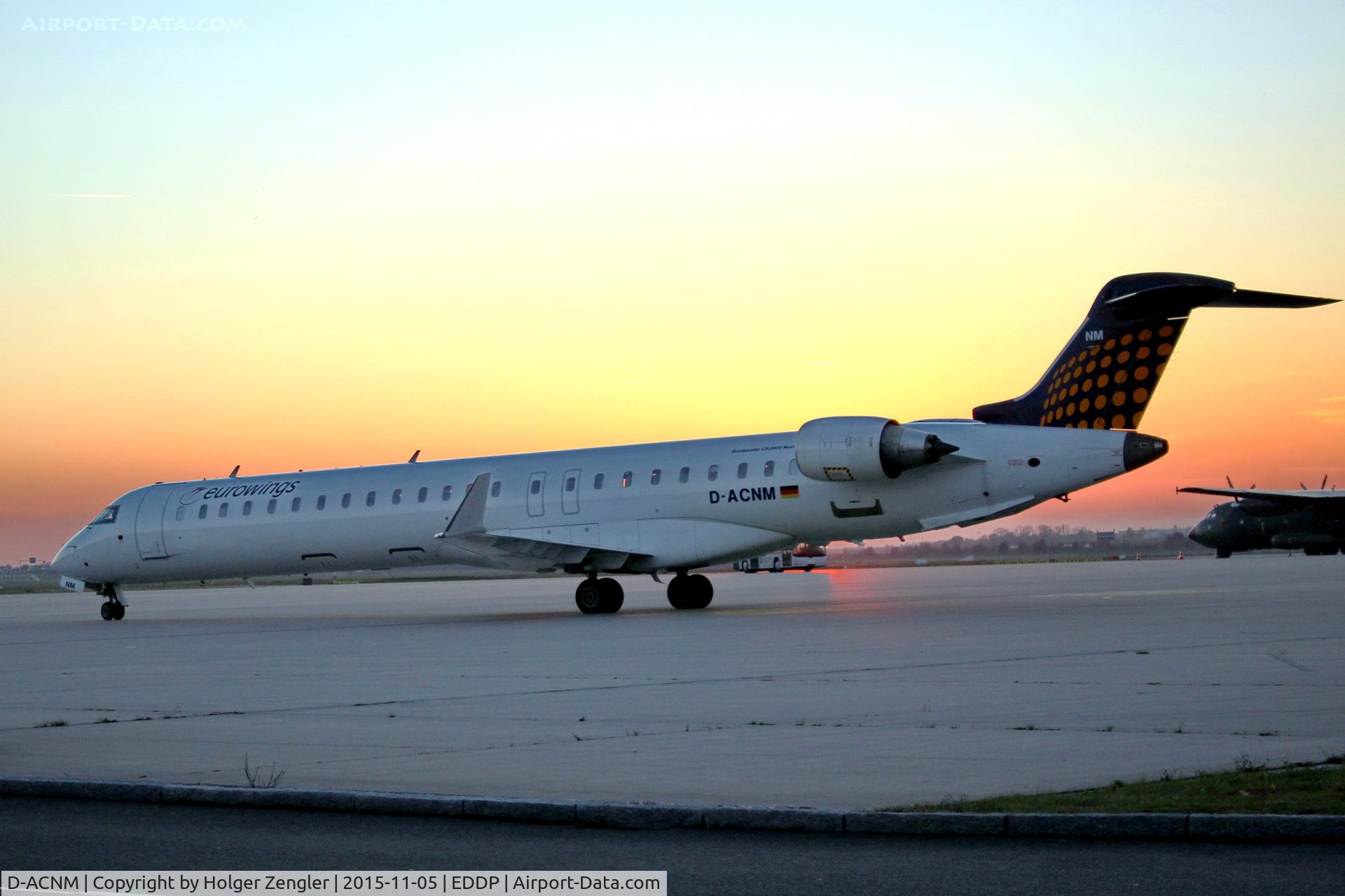 D-ACNM, 2010 Bombardier CRJ-900LR (CL-600-2D24) C/N 15253, Last sunlight on apron 1 west...