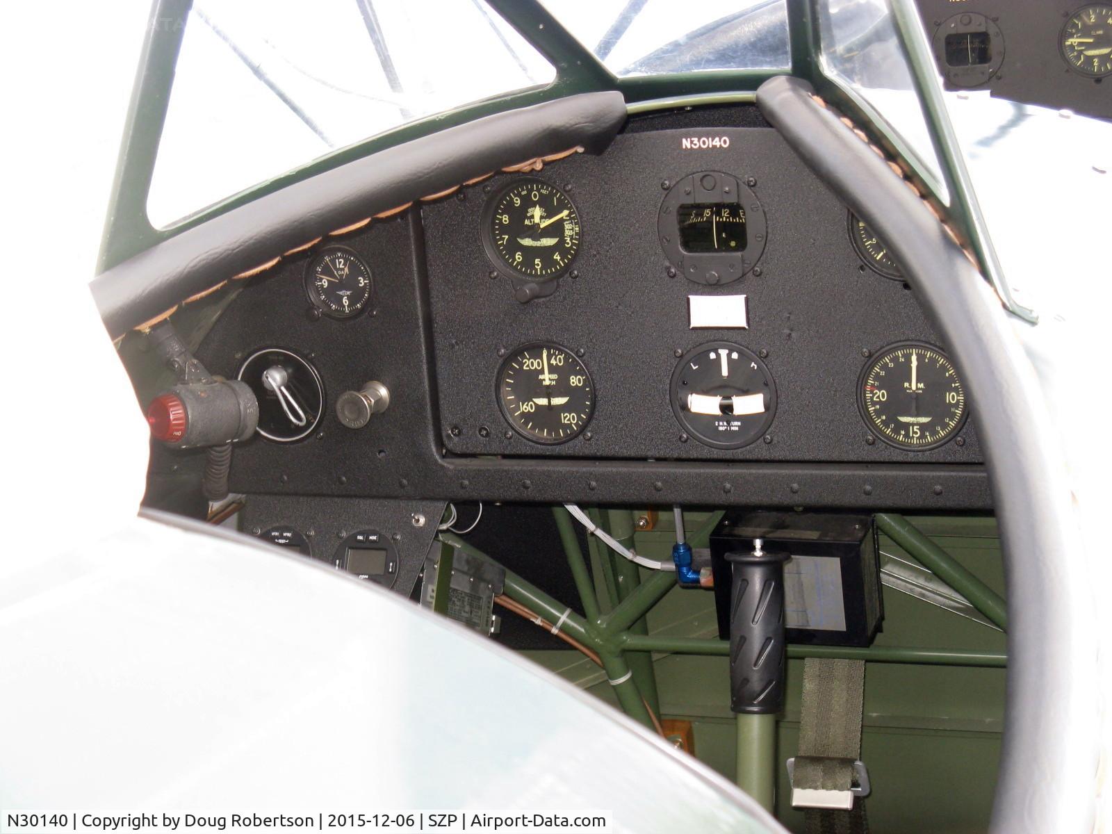 N30140, 1940 Waco UPF-7 C/N 5537, 1940 WACO UPF-7, Continental W670 220 Hp radial, rear cockpit instrument panel, flown solo from here. Auto-flash probably? wiped out the fuselage color.
