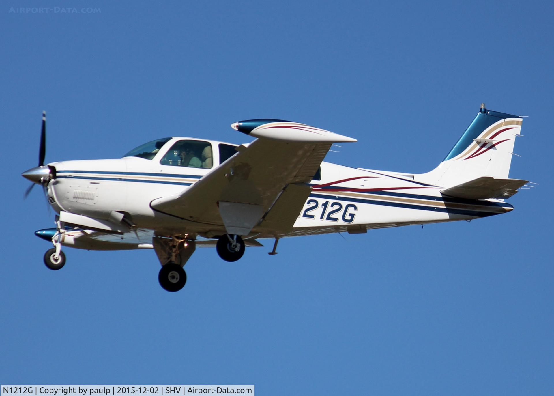 N1212G, 1988 Beech A36 Bonanza 36 C/N E-2418, Landing at Shreveport Regional.