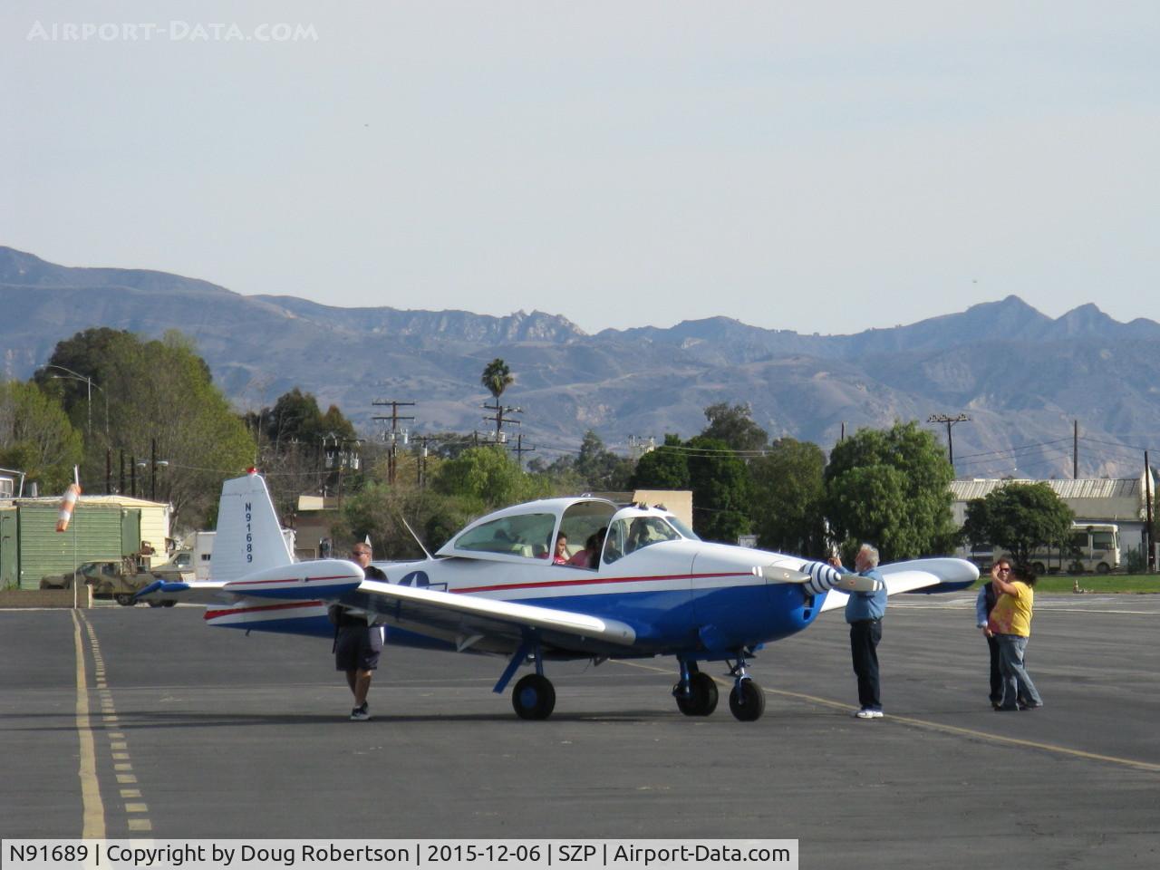 N91689, 1946 North American Navion (NA-145) C/N NAV-4-431, 1946 North American NAVION, Continental E225, Young Eagles flight boarded for flight, relatives taking photos of the kids before taxi to Rwy 04