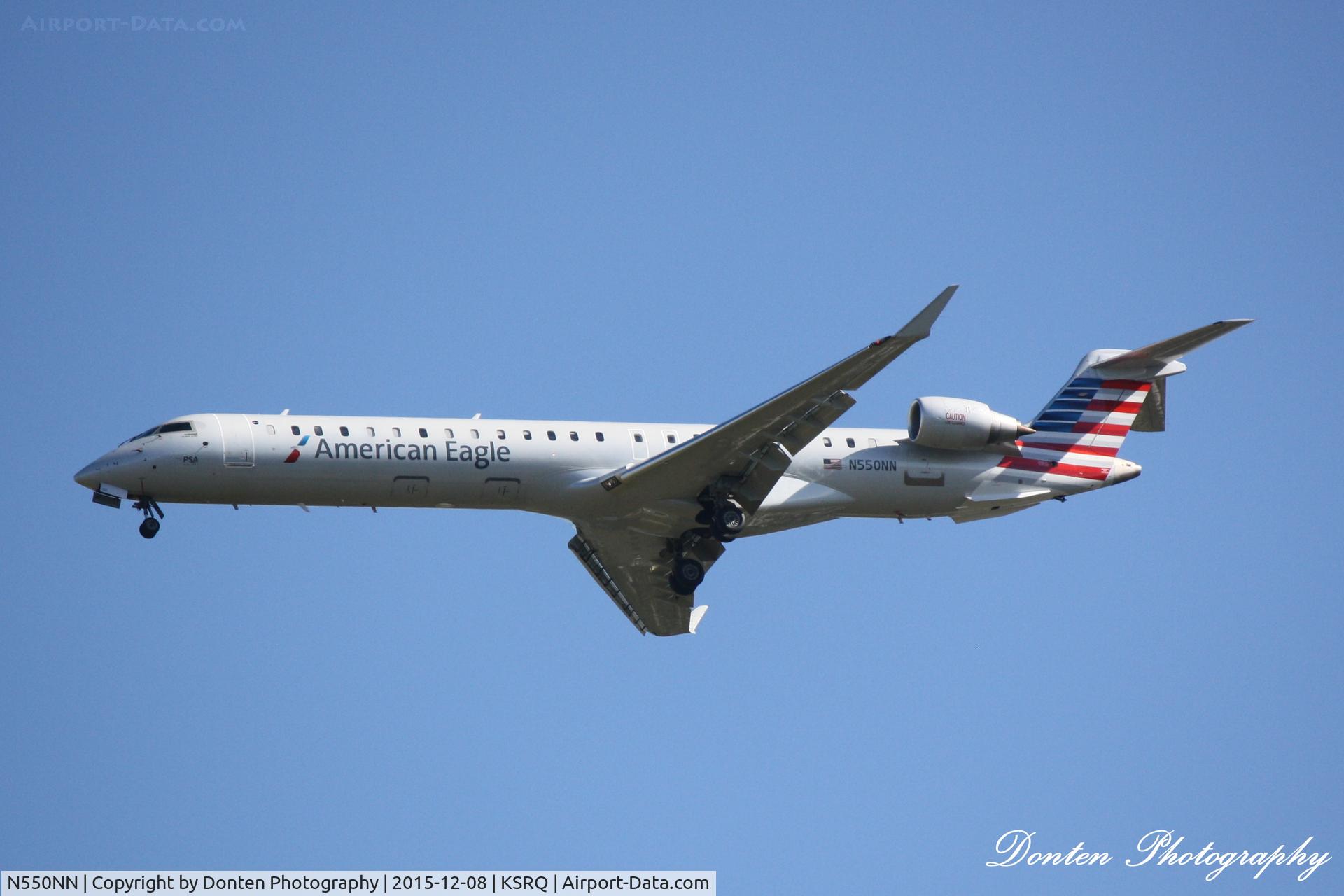 N550NN, 2014 Bombardier CRJ-900ER (CL-600-2D24) C/N 15323, American Flight 5139 operated by PSA (N550NN) arrives at Sarasota-Bradenton International Airport following flight from Charlotte-Douglas International Airport