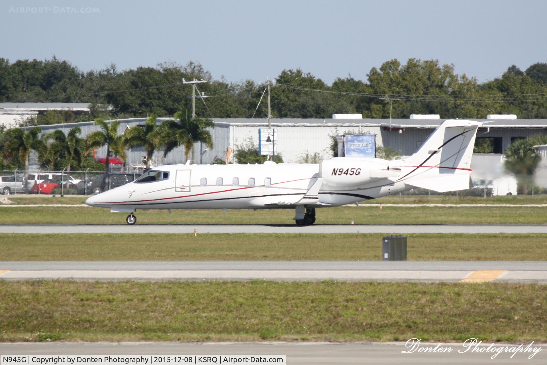 N945G, 1997 Learjet Inc 60 C/N 106, Learjet 60 (N945G) departs Sarasota-Bradenton International Airport