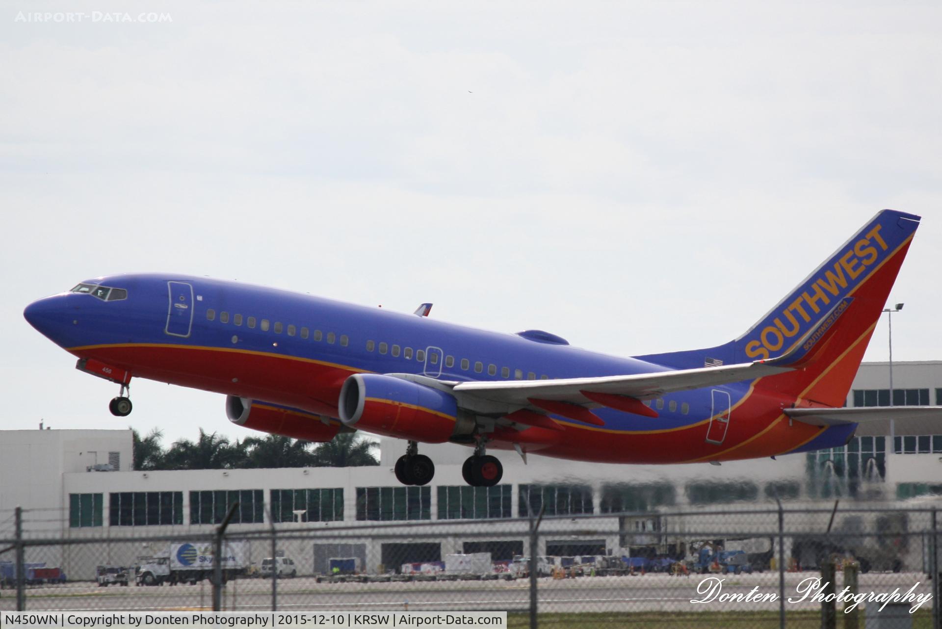 N450WN, 2004 Boeing 737-7H4 C/N 32470, Southwest Flight 2139 (N450WN) departs Southwest Florida International Airport enroute to Indianapolis International Airport