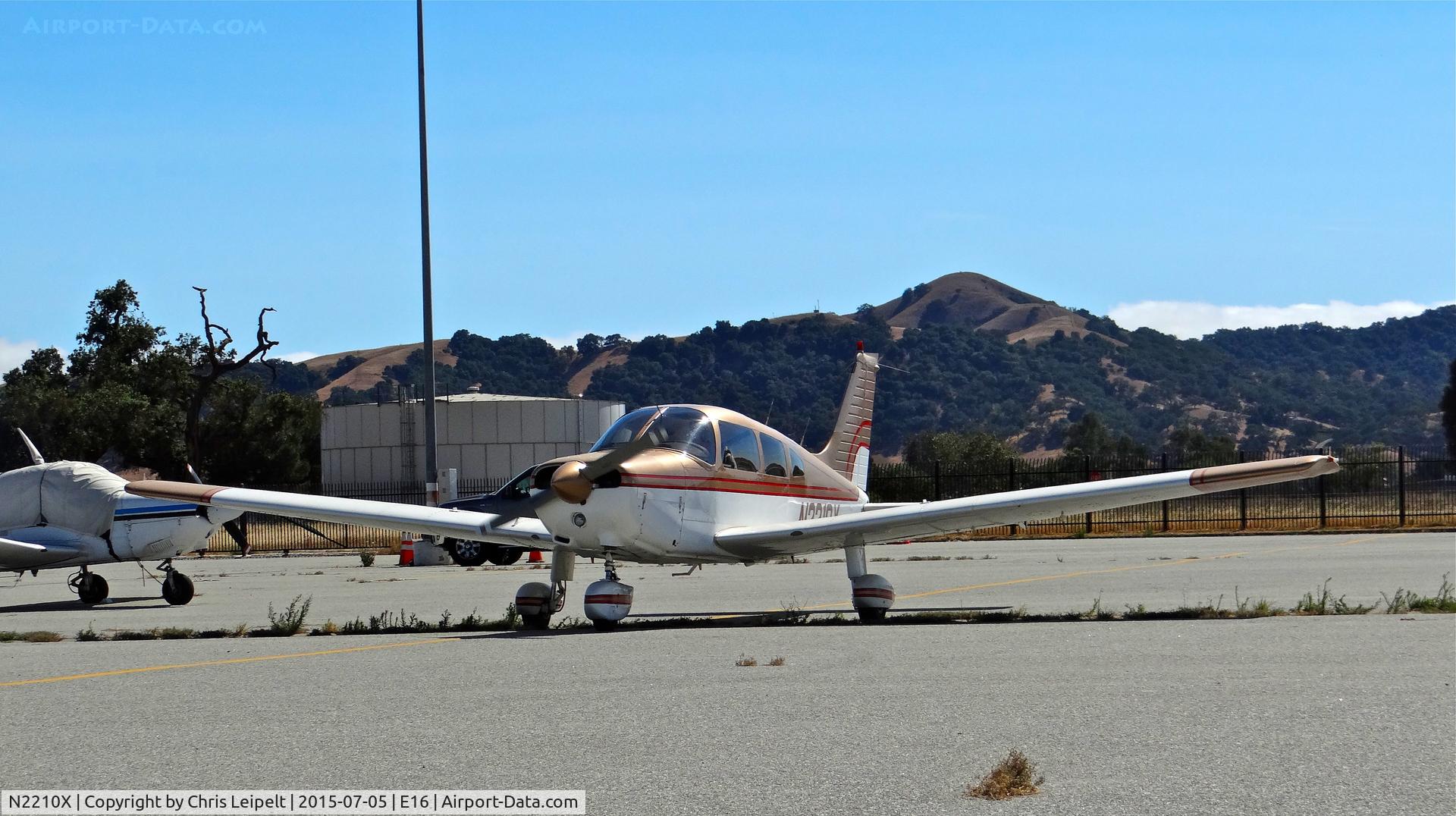 N2210X, 1979 Piper PA-28-161 C/N 28-7916351, Locally-based 1979 Piper PA-28-161 taxing out for departure from the south tie downs at South County Airport, San Martin, CA.