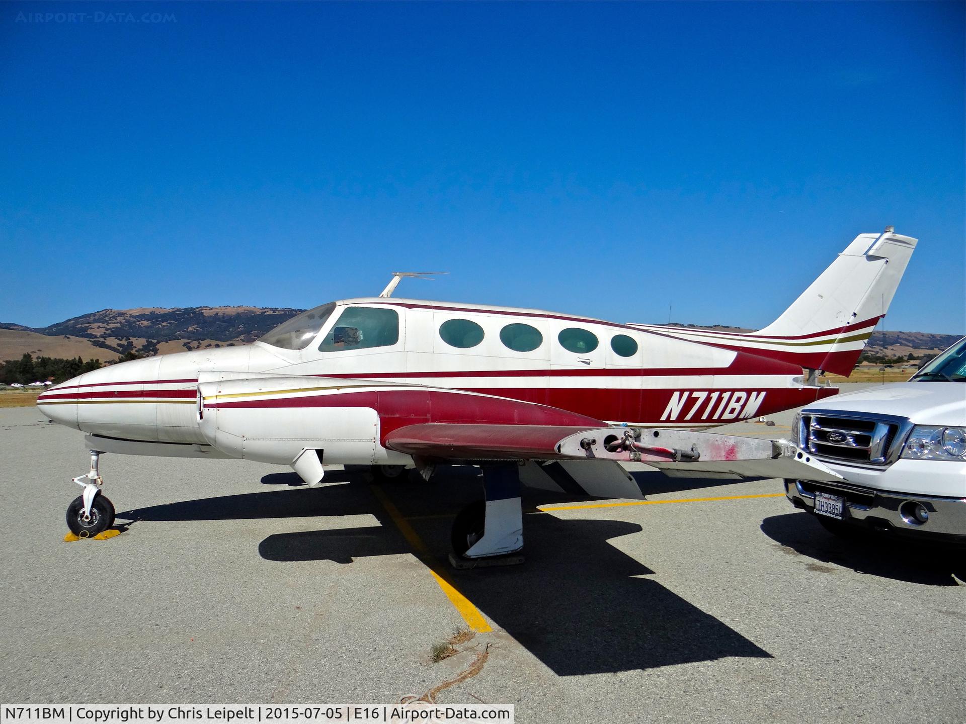 N711BM, 1966 Cessna 411 C/N 411-0220, Poor old locally-based 1966 Cessna 411 (minus props) parked at the south tie downs at South County Airport, San Martin, CA. It is one of the two rotting C411s at E16 and this one hasn't been touched in years.