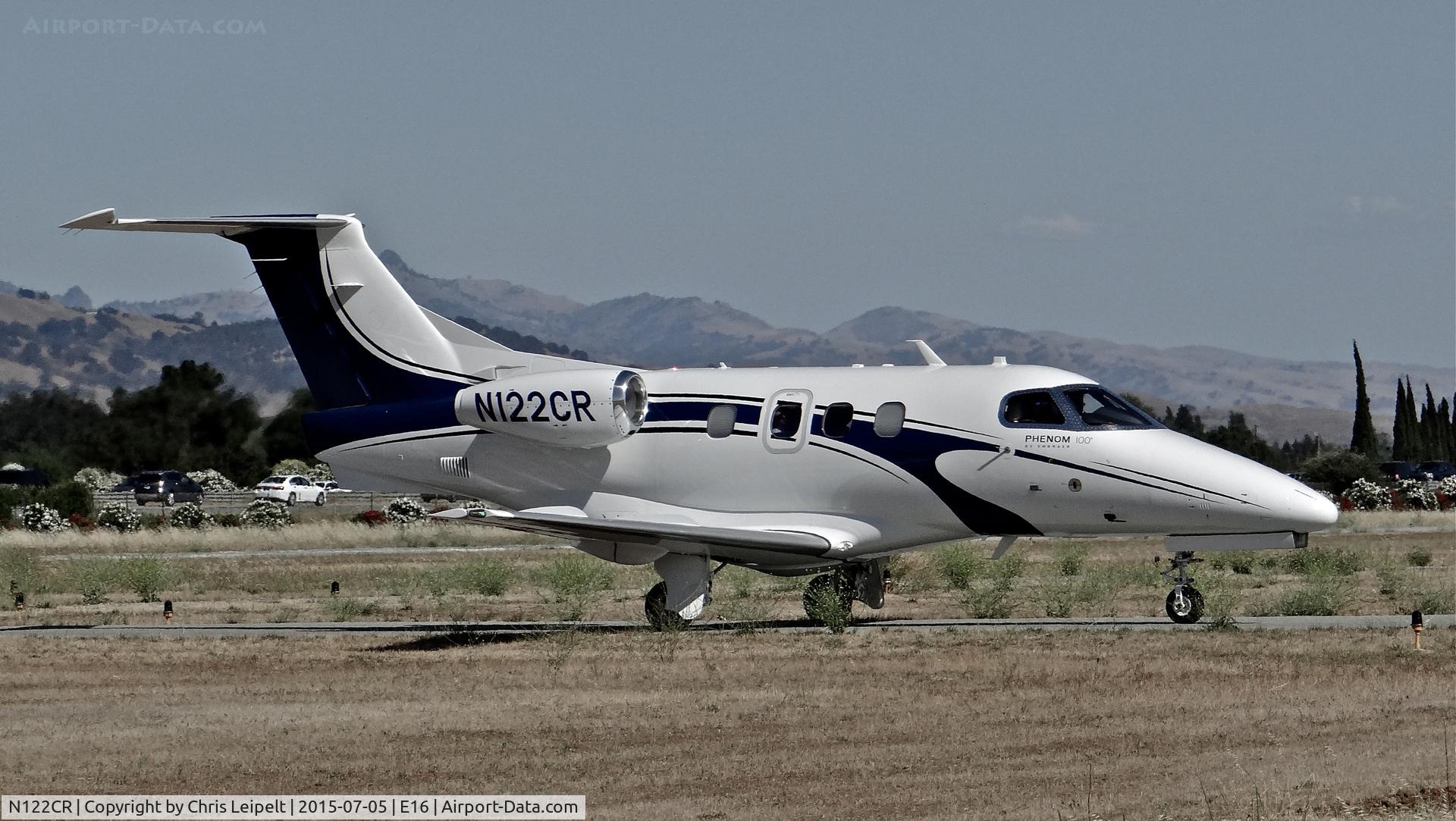 N122CR, 2013 Embraer EMB-500 Phenom 100 C/N 50000315, Locally-based 2013 Embraer Phenom 100 taxing to its hangar at South County Airport, San Martin, CA. Owned by Christopher Ranch LLC, a garlic farm out of nearby Gilroy.