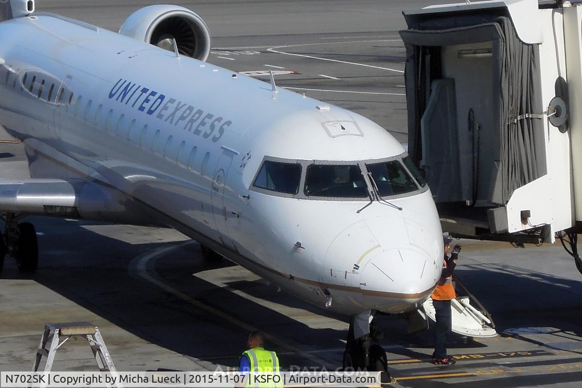 N702SK, 2004 Bombardier CRJ-701ER (CL-600-2C10) Regional Jet C/N 10136, At San Francisco
