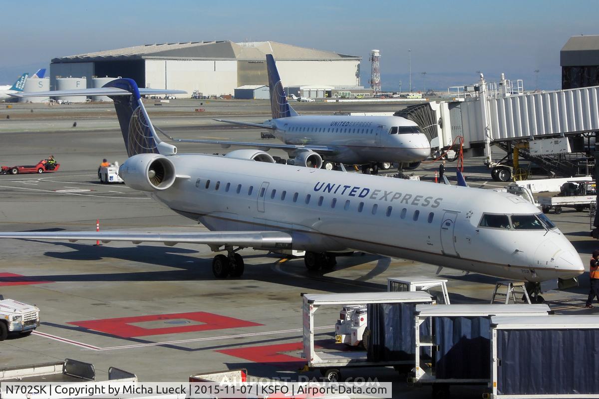 N702SK, 2004 Bombardier CRJ-701ER (CL-600-2C10) Regional Jet C/N 10136, At San Francisco