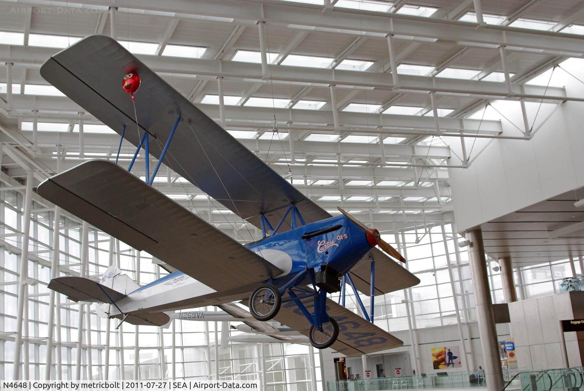 N4648, 1928 Alexander Eaglerock Combo-Wing C/N 469, On display at terminal