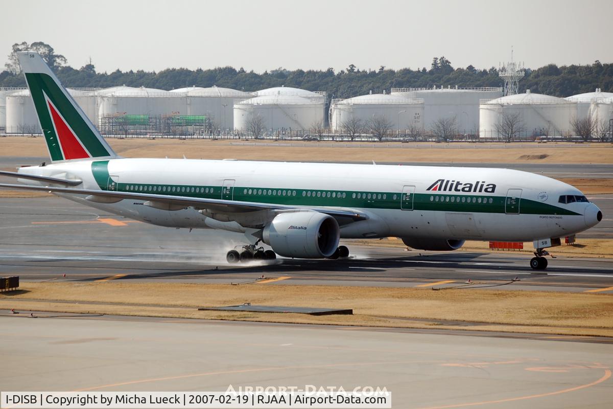 I-DISB, 2002 Boeing 777-243/ER C/N 32859, Puddles