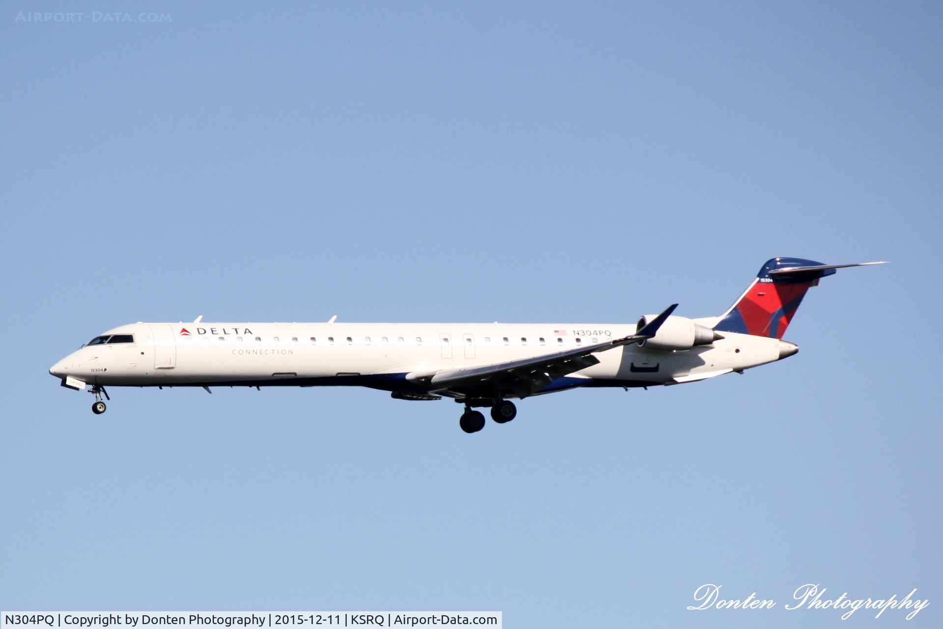 N304PQ, 2014 Bombardier CRJ-900LR (CL-600-2D24) C/N 15304, Delta Flight 3830 operated by Endeavor Air (N304PQ) arrives at Sarasota-Bradenton International Airport following flight from LaGuardia Airport