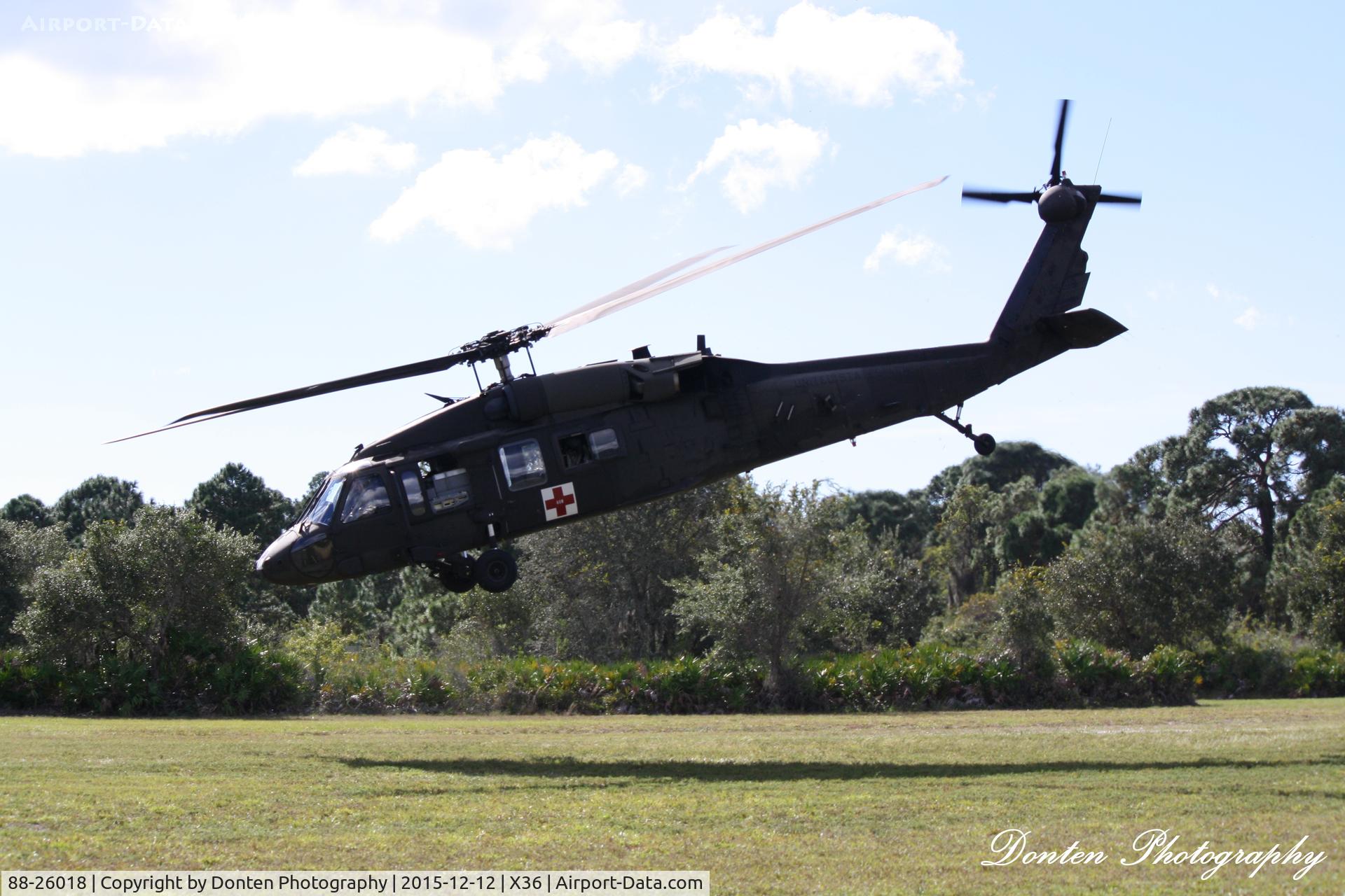 88-26018, 1988 Sikorsky UH-60A Black Hawk C/N 70.1225, US Army UH-60 Blackhawk (88-26018) performs a touch and go at Buchan Airport