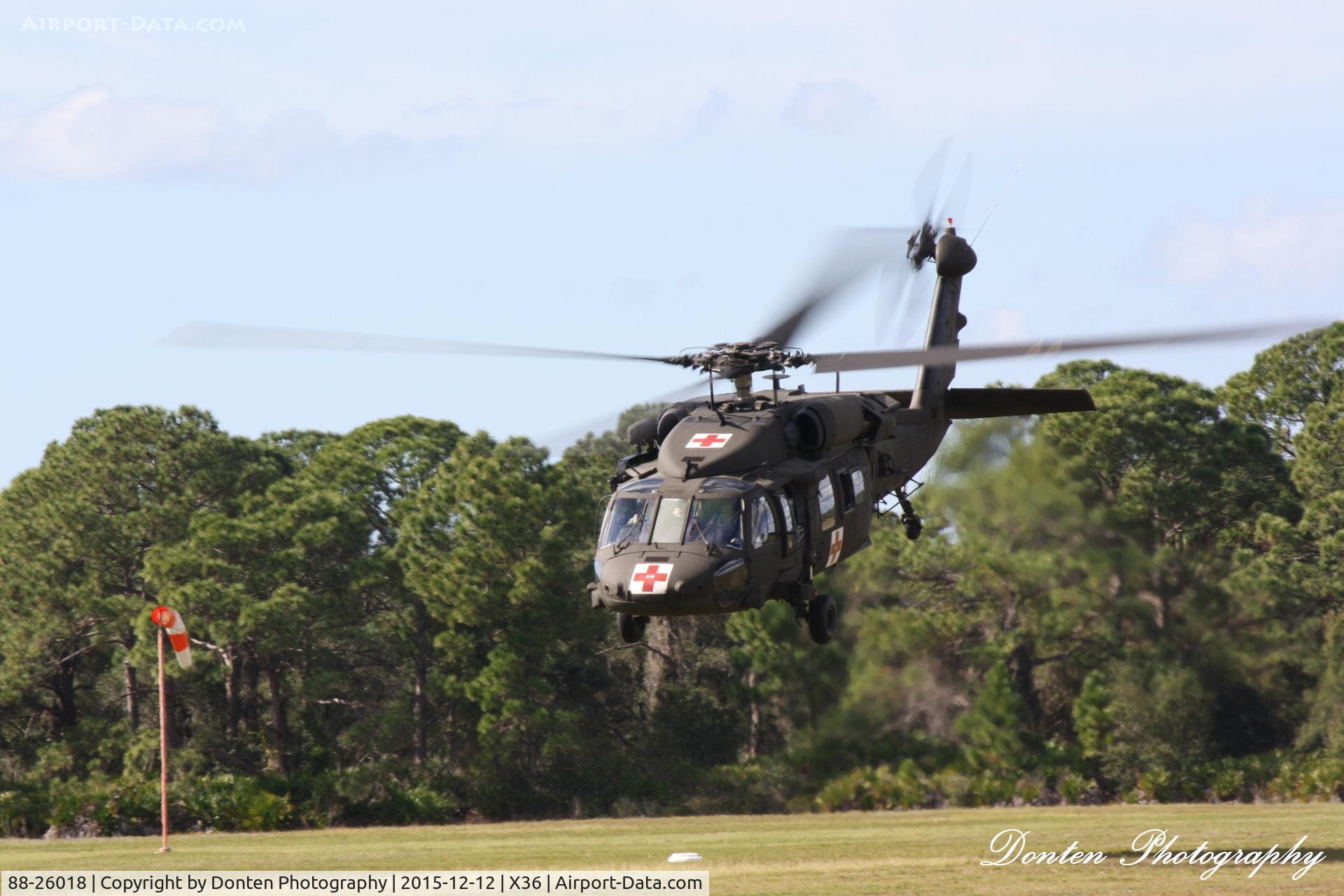 88-26018, 1988 Sikorsky UH-60A Black Hawk C/N 70.1225, US Army UH-60 Blackhawk (88-26018) performs a touch and go at Buchan Airport