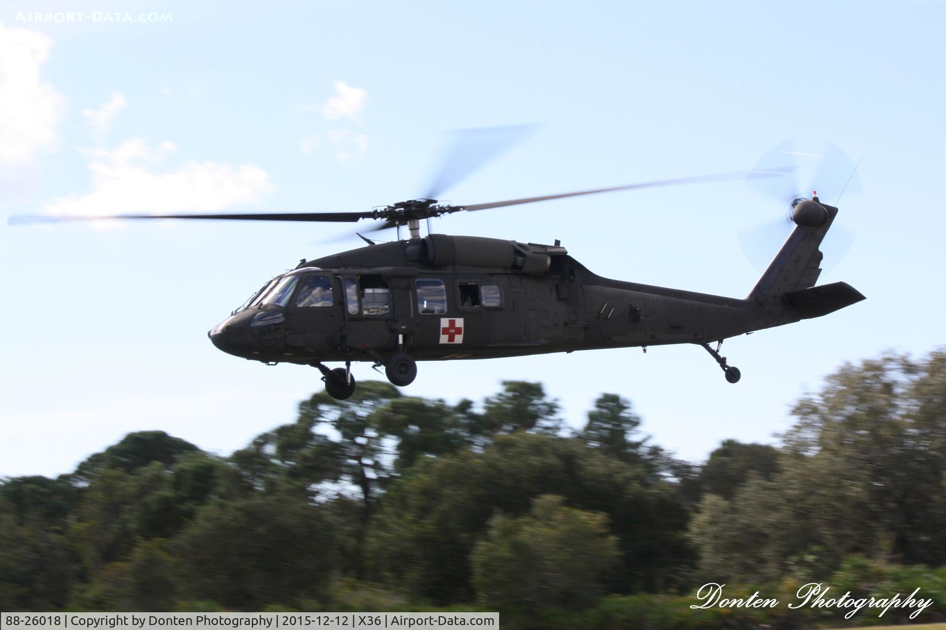 88-26018, 1988 Sikorsky UH-60A Black Hawk C/N 70.1225, US Army UH-60 Blackhawk (88-26018) performs a touch and go at Buchan Airport