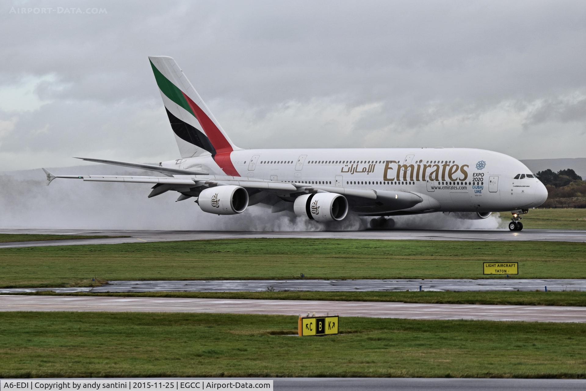 A6-EDI, 2009 Airbus A380-861 C/N 028, just landed on 23R very wet runway
