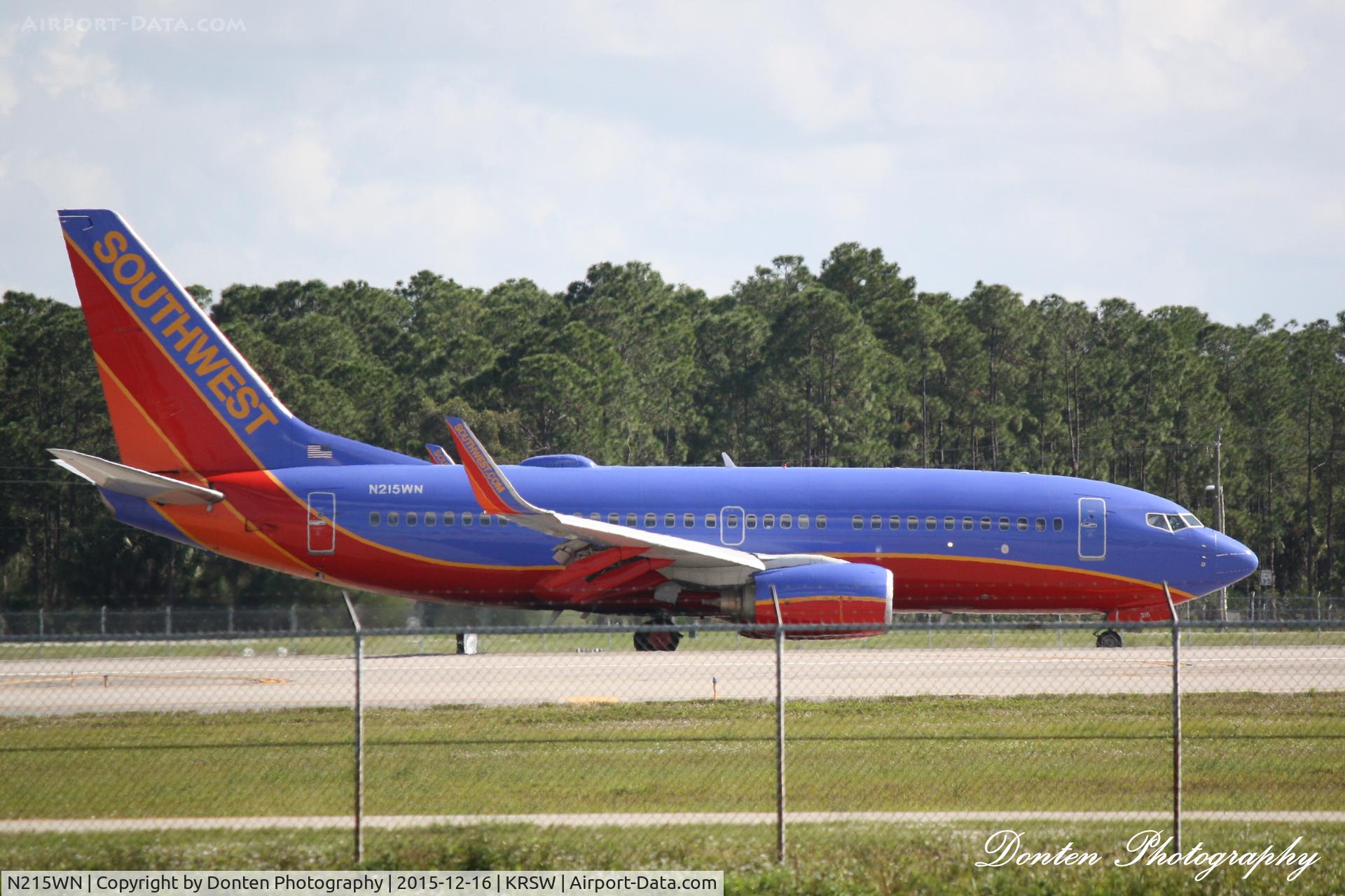 N215WN, 2005 Boeing 737-7H4 C/N 32487, Southwest Flight 371 (N215WN) arrives at Southwest Florida International Airport following flight from Akron-Canton Regional Airport