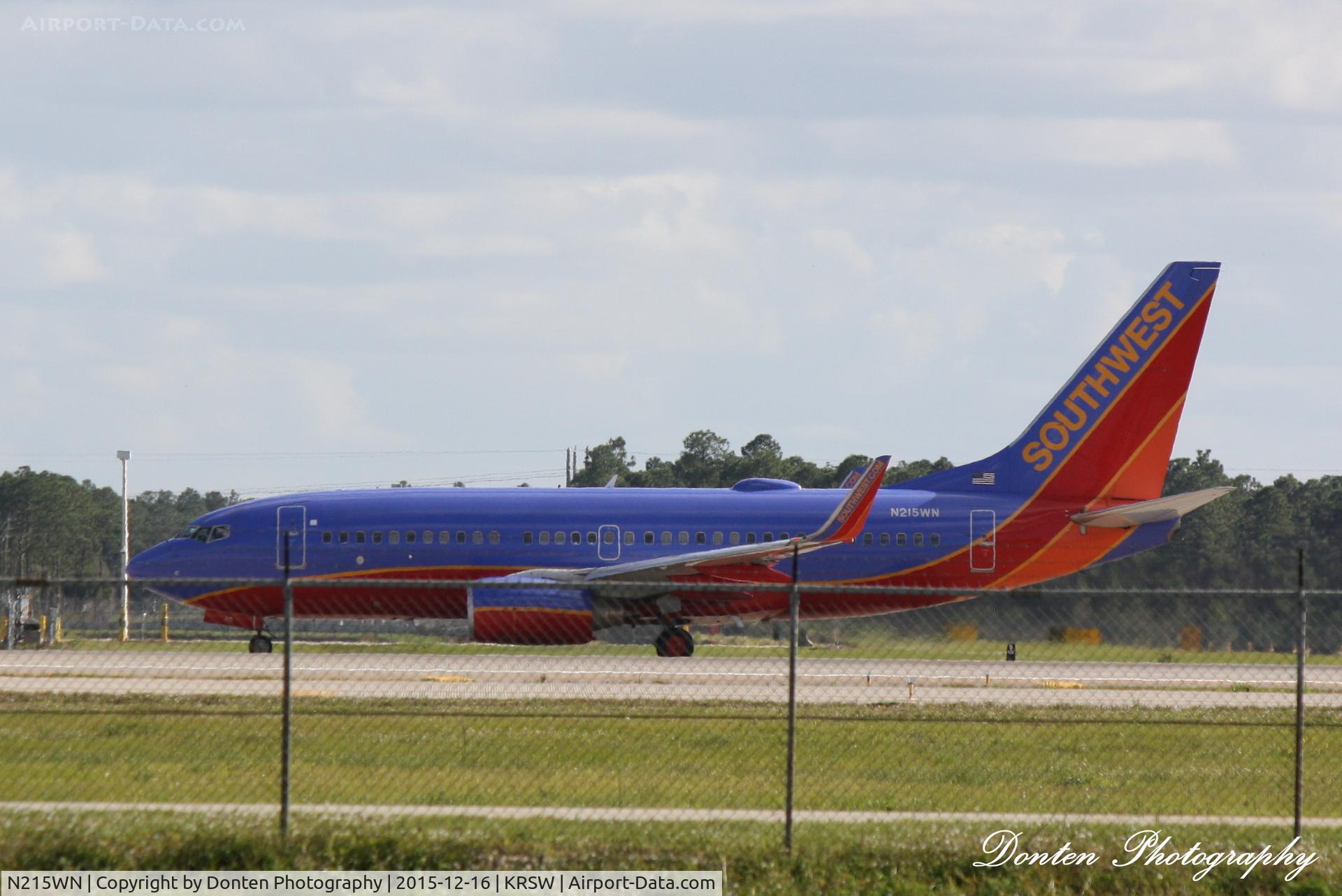 N215WN, 2005 Boeing 737-7H4 C/N 32487, Southwest Flight 2603 (N215WN) departs Southwest Florida International Airport enroute to Baltimore/Washington International Airport