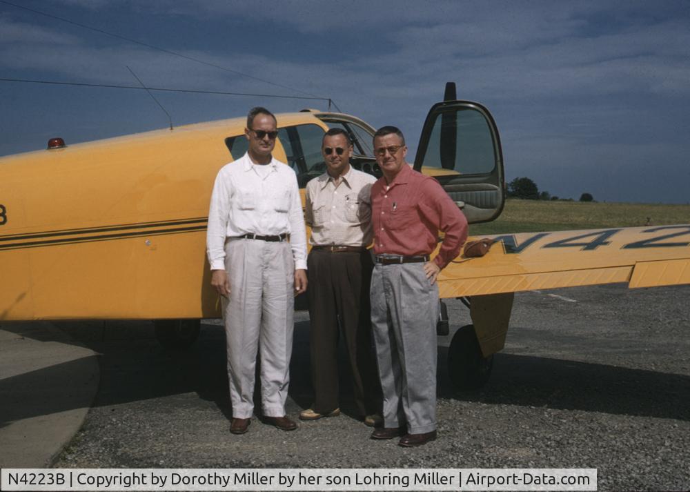 N4223B, 1955 Beech F35 Bonanza C/N D-4190, The airplane in 1956 at the Meadville, Pa airport.  The picture has Franklin Miller standing between George and Bill Dearment, owners of Channellock Tools.