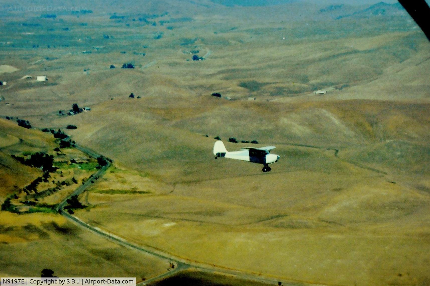N9197E, 1946 Aeronca 11AC Chief C/N 11AC-831, 97E as it flys east in the Livermore Valley,Ca.