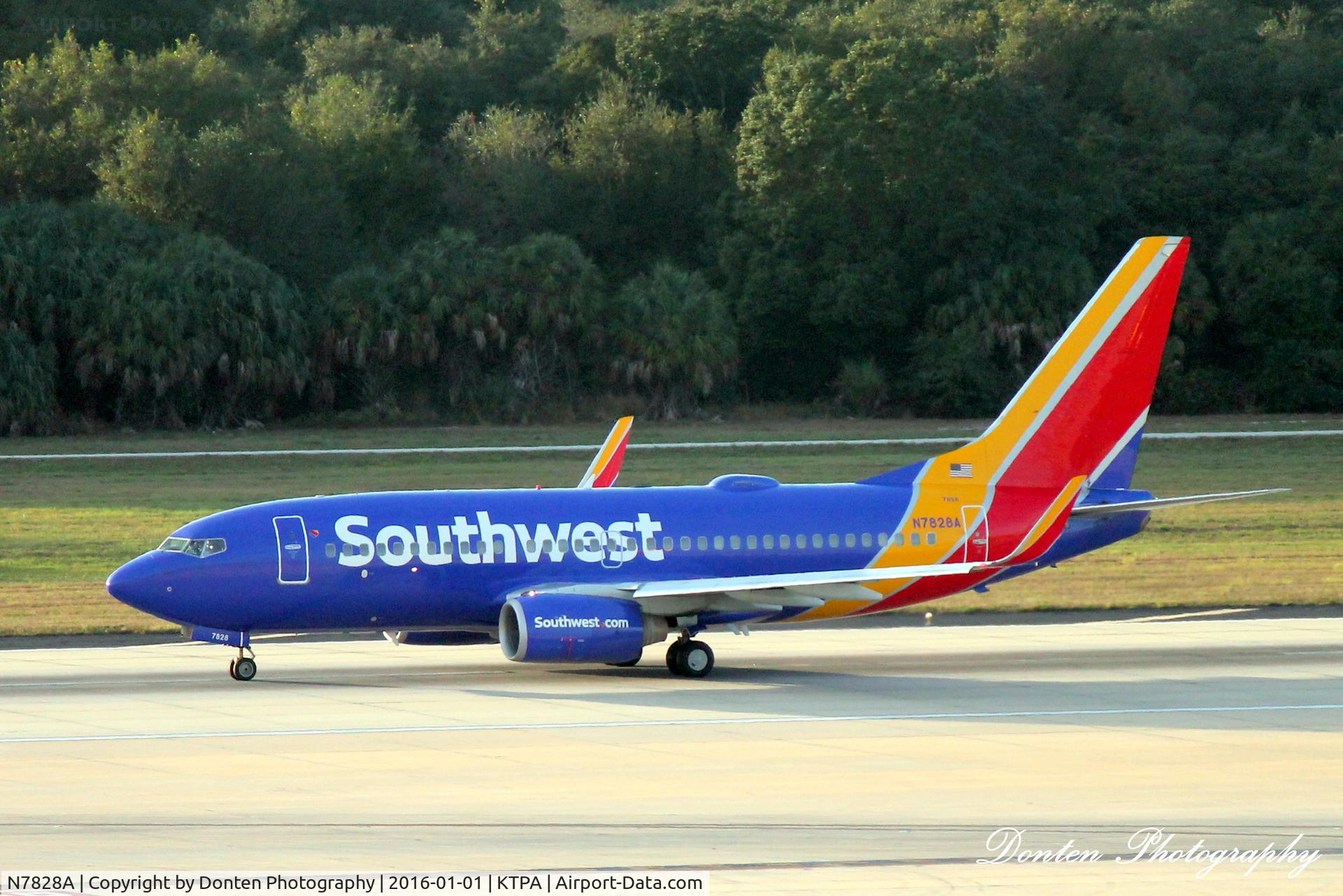 N7828A, 2003 Boeing 737-7CT C/N 33697, Southwest Flight 1830 (N7828A) departs Tampa International Airport enroute to General Mitchell International Airport