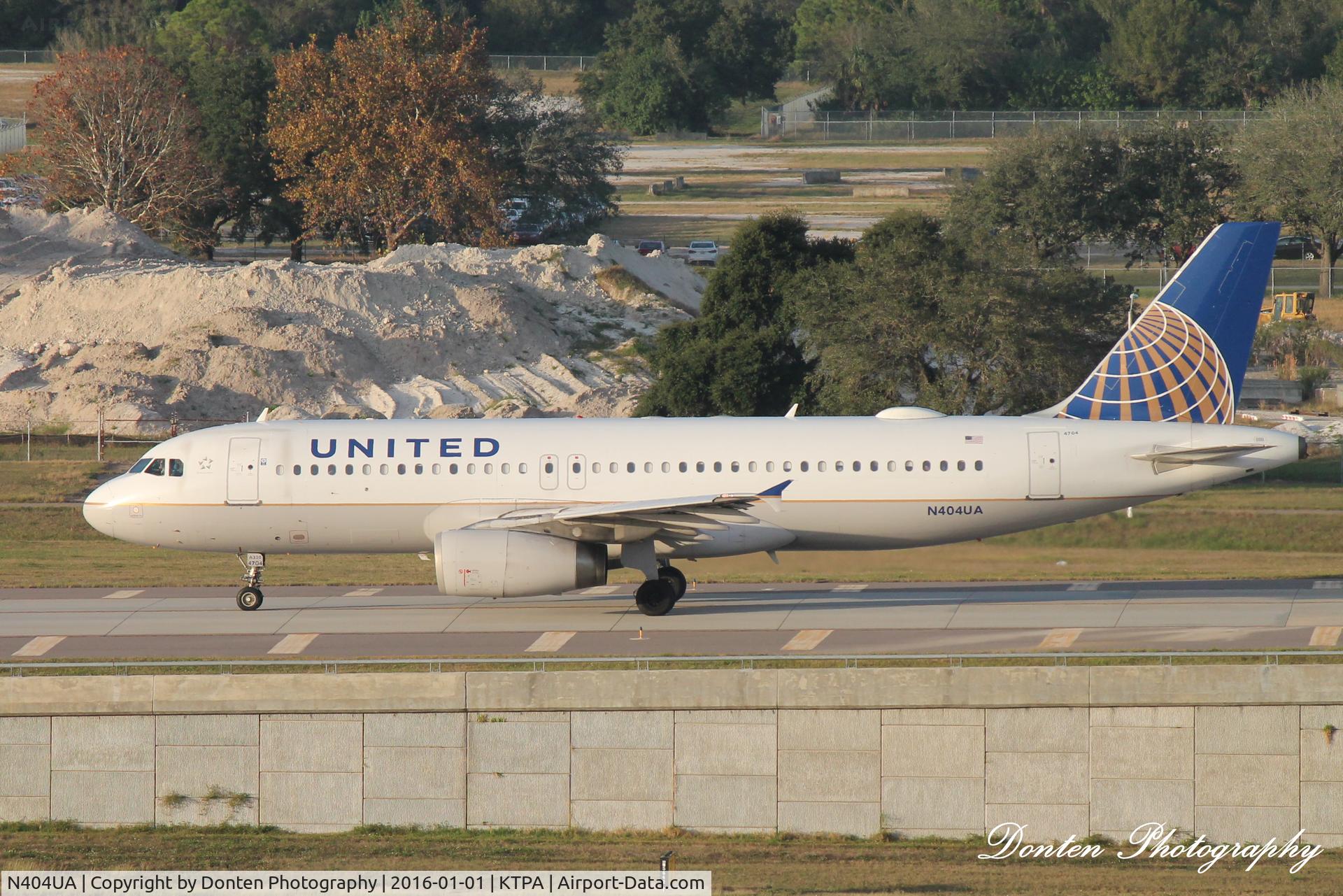 N404UA, 1993 Airbus A320-232 C/N 450, United Flight 1166 (N404UA) taxis at Tampa International Airport prior to flight to Houston-Bush Intercontinental Airport