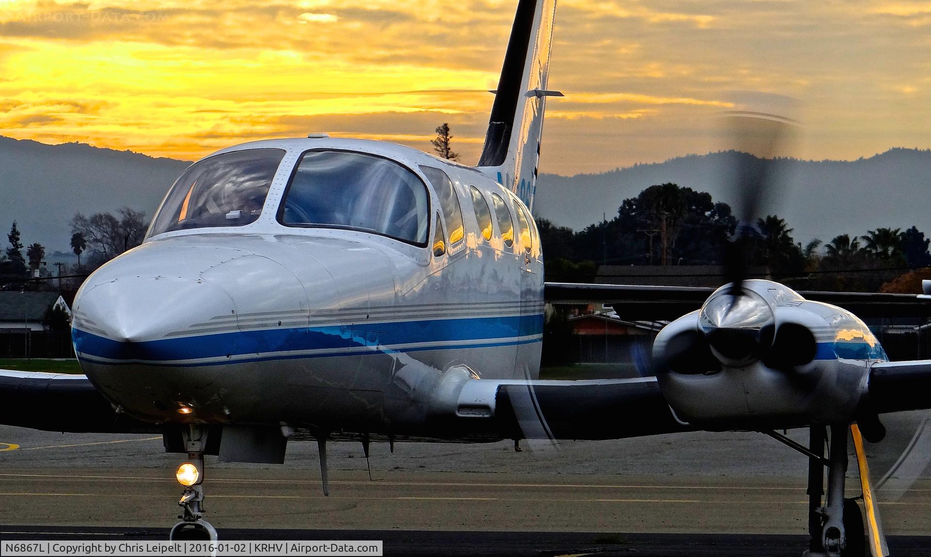 N6867L, 1981 Cessna 421C Golden Eagle C/N 421C1087, Locally-based Cessna 421C preparing for taxi out and departure with a beautiful sunset in the background at Reid Hillview Airport, San Jose, CA.