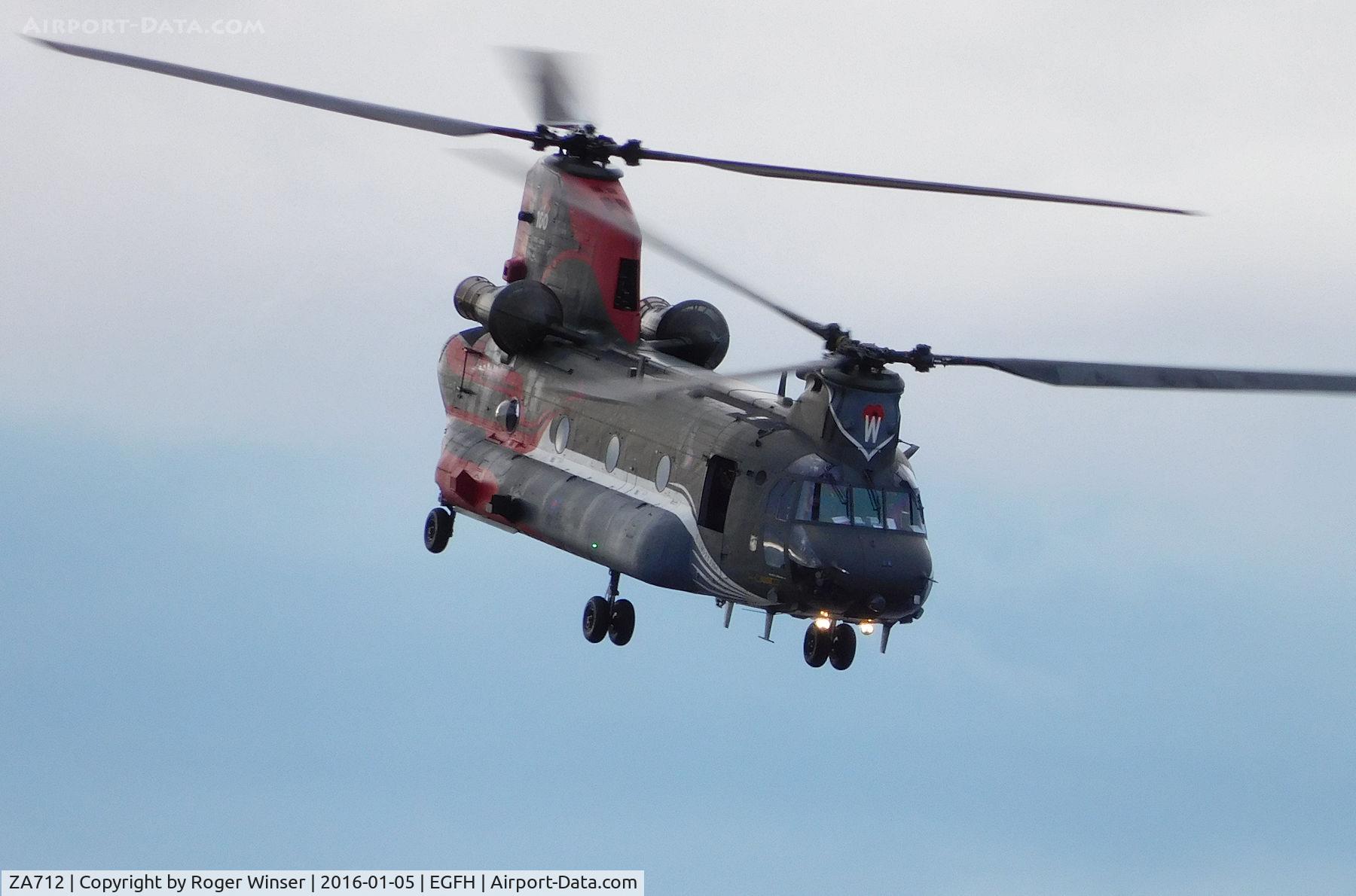 ZA712, Boeing Vertol Chinook HC.4 C/N MA024/M7016, Chinook HC.4 helicopter coded W of 18(B) Squadron RAF carrying 1915 - 2015 anniversary markings lifting off from Runway 04 after a brief visit.