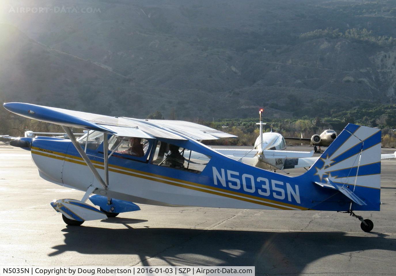 N5035N, 1978 Bellanca 8KCAB Decathlon C/N 470-79, 1978 Bellanca 8KCAB DECATHLON, Lycoming AEIO-320 150 hp, full inverted systems, taxi to taxiway, shifting Santana crosswind favors 04