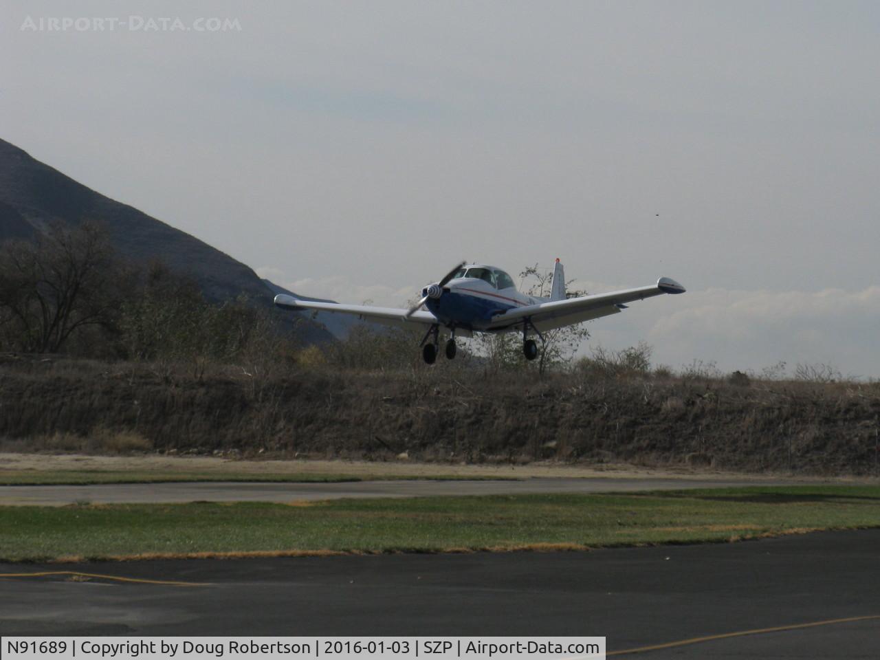 N91689, 1946 North American Navion (NA-145) C/N NAV-4-431, 1946 North American NAVION, Continental E235 Upgrade, on final Rwy 04, Young Eagles Flight.