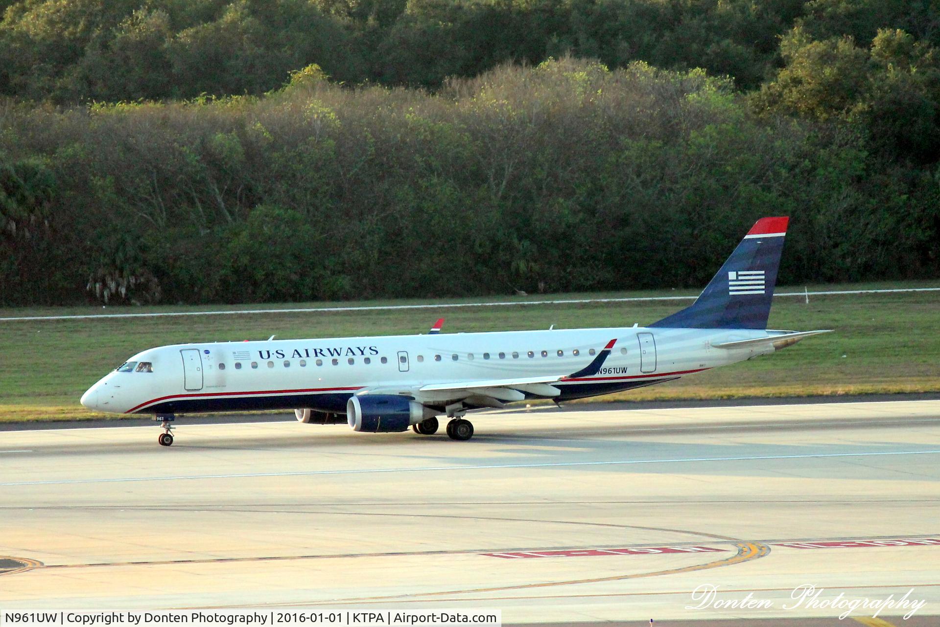 N961UW, 2008 Embraer 190AR (ERJ-190-100IGW) C/N 19000183, American Flight 682 (N961UW) departs Tampa International Airport enroute to Philadelphia International Airport