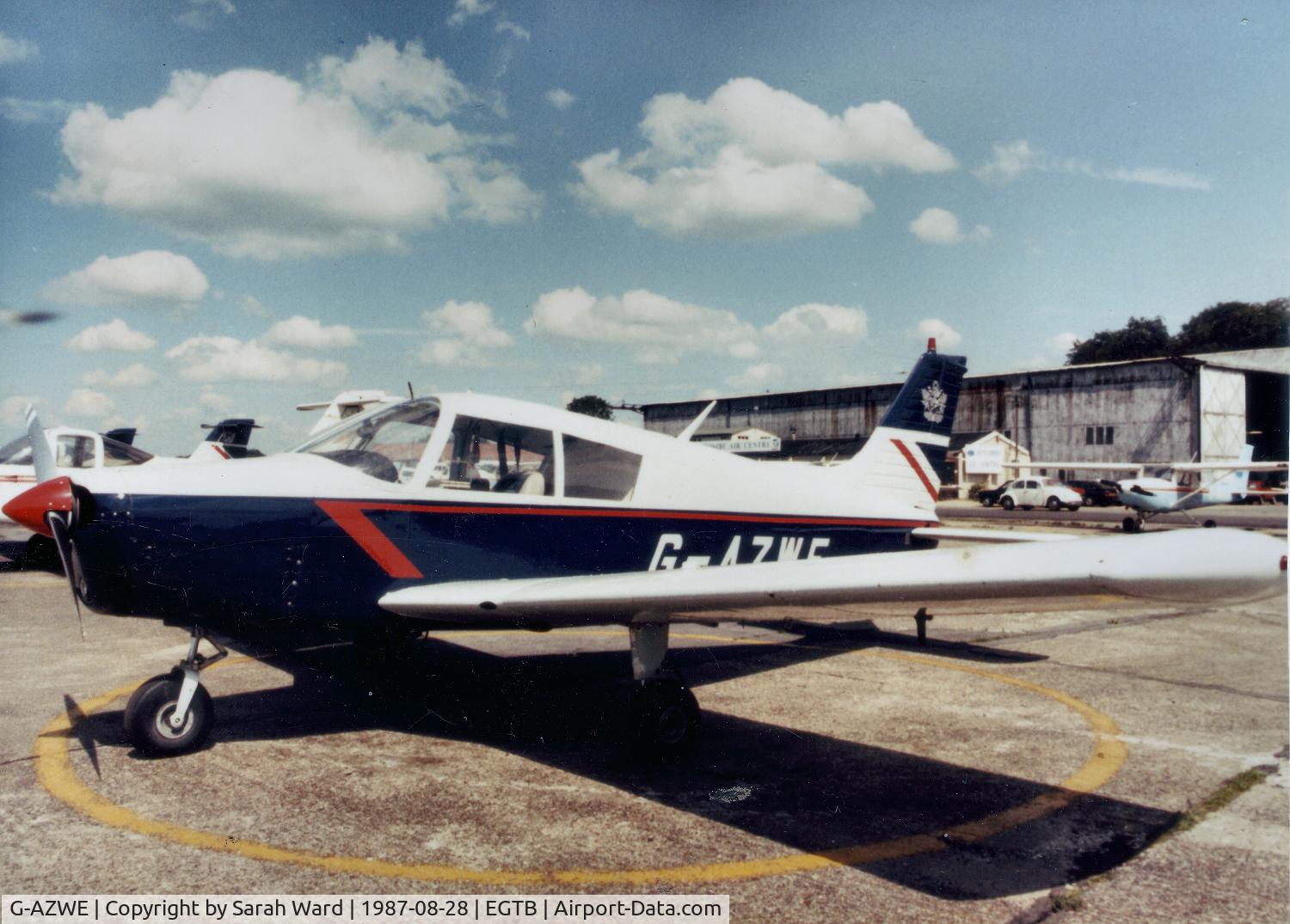 G-AZWE, 1972 Piper PA-28-140 Cherokee C/N 28-7225303, G-AZWE at Wycombe Air Park, Booker in 1987.  British Airways Flying Club.  Photo taken during pre-flighting prior to flight to Luton Airport.