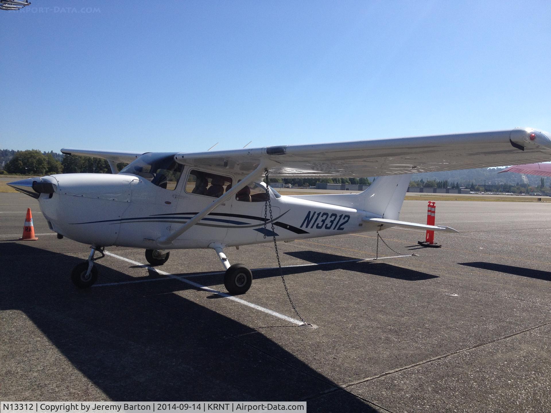 N13312, 2006 Cessna 172S C/N 172S10401, N13312 with tie-down chains still attached.