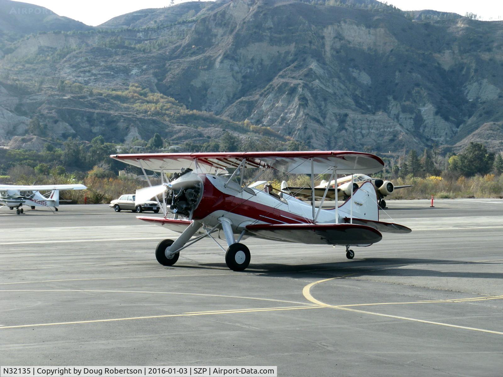 N32135, 1941 Waco UPF-7 C/N 5767, 1941 Waco UPF-7, Continental W670 220 Hp radial, a stunning showplane with chrome engine & prop, taxi to Rwy 22