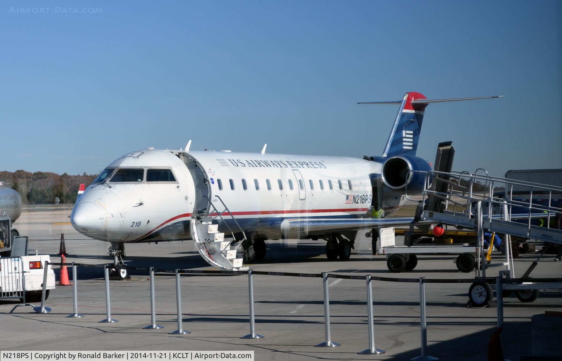 N218PS, 2003 Bombardier CRJ-200ER (CL-600-2B19) C/N 7885, At the gate CLT