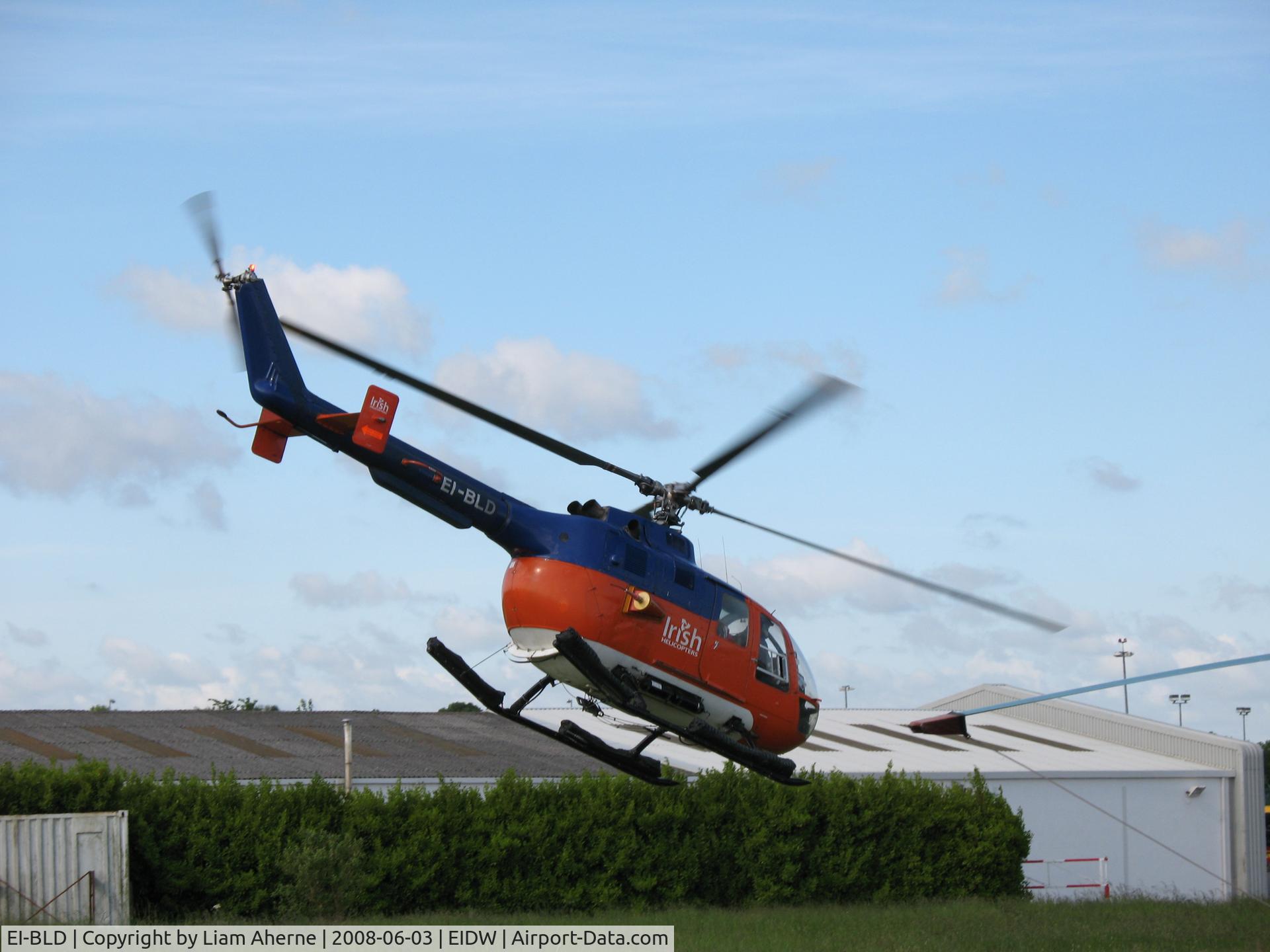 EI-BLD, 1979 MBB Bo-105DB C/N S-381, Capt. Mick Conneally pulls power in EI-BLD as he heads out on another week's flying in support of the Commissioners of Irish Lights contract, servicing various lighthouses around the coast of the island of Ireland. Both have now retired!