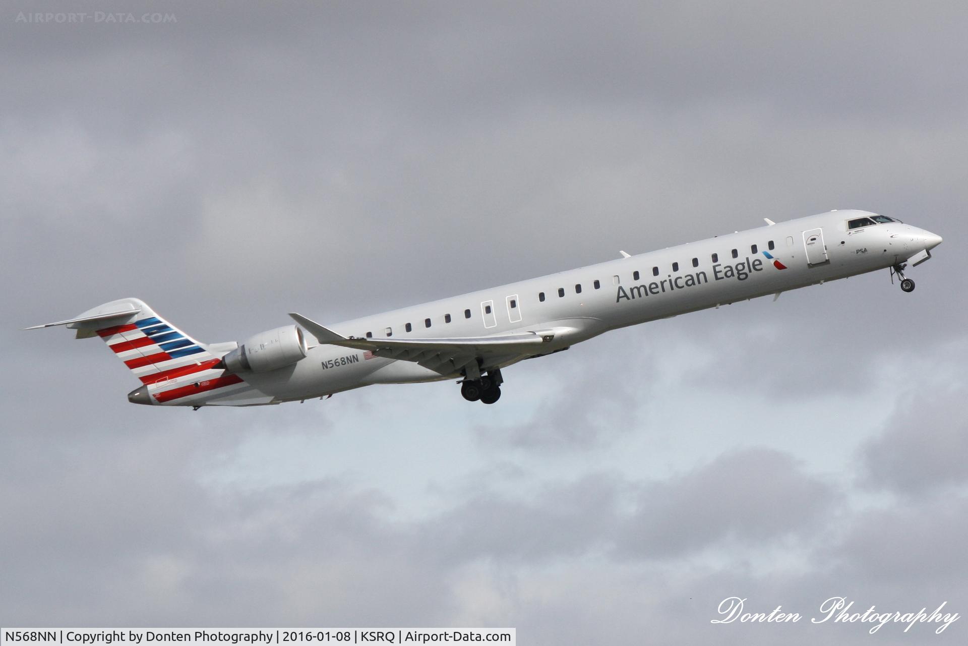 N568NN, 2015 Bombardier CRJ-900 (CL-600-2D24) C/N 15355, American Flight 5139 operated by PSA (N568NN) departs Sarasota-Bradenton International Airport enroute to Charlotte-Douglas International Airport