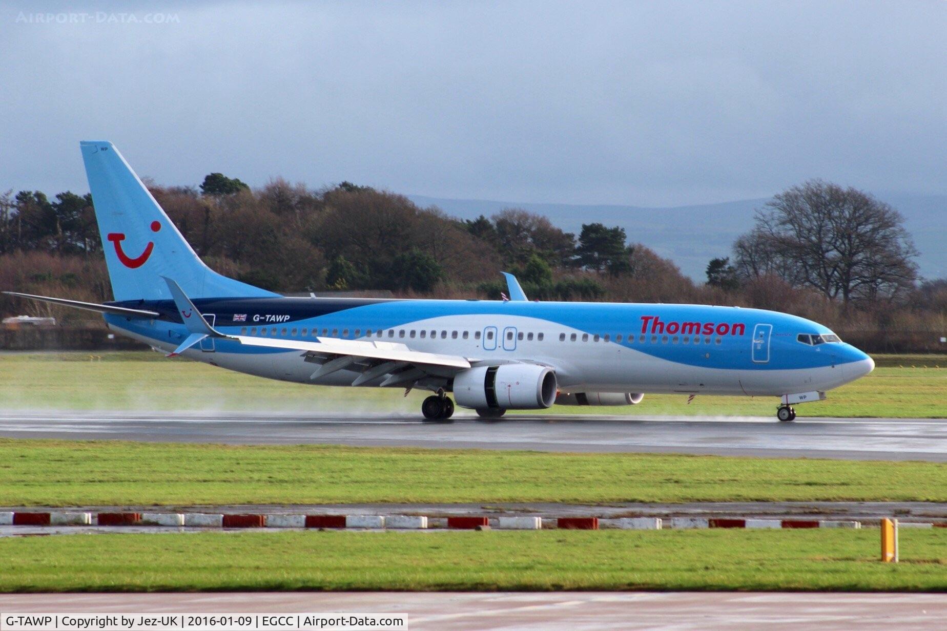 G-TAWP, 2013 Boeing 737-8K5 C/N 37257, rollout and reverse thrust on a wet runway 23r,