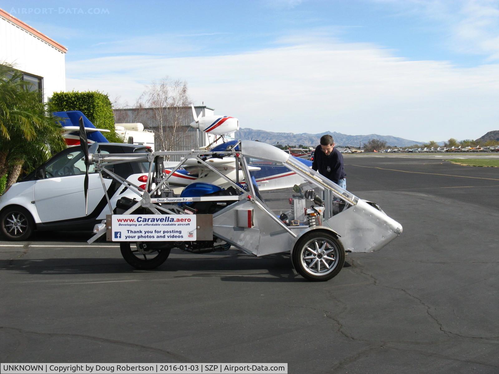 UNKNOWN, Miscellaneous Various C/N unknown, Caravella Aerospace CARAVELLAIR Roadable Aircraft Prototype LSA, with Joe Caravella, Executive Director-Roadable Aircraft Owners and Pilots Association, behind his aircraft, less folding wings & twin tail-booms