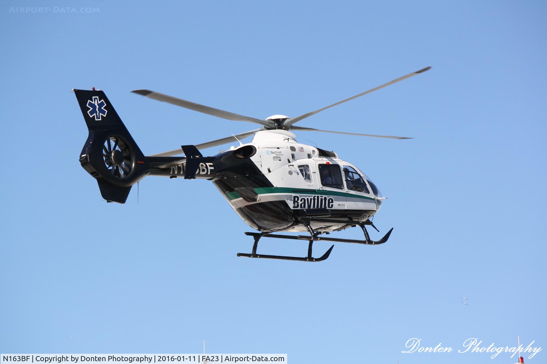 N163BF, Eurocopter EC-135P-2+ C/N 0671, Bayflite (N163BF) departs the helipad at Sarasota Memorial Hospital