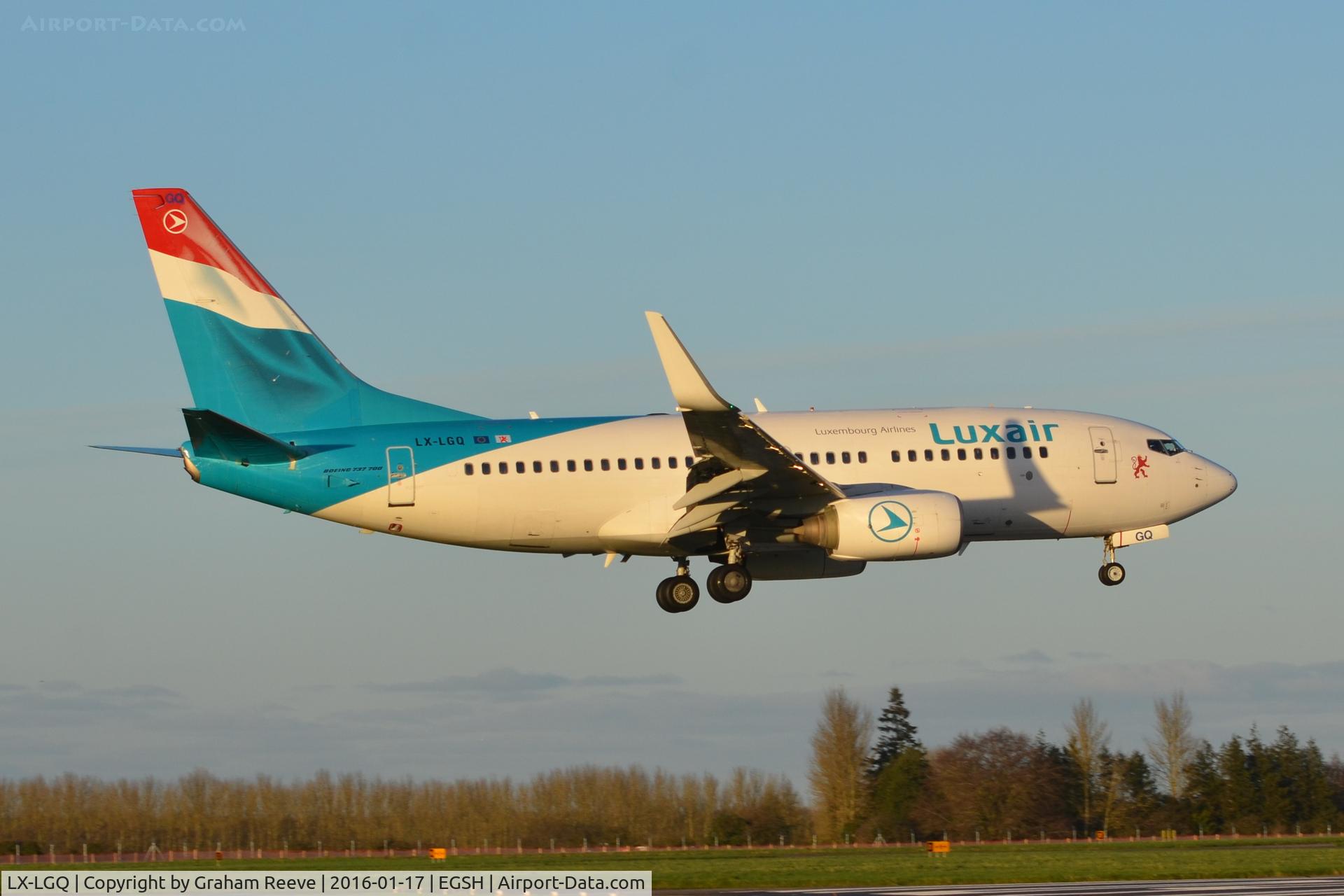 LX-LGQ, 2004 Boeing 737-7C9 C/N 33802, Landing in the late afternoon sun.