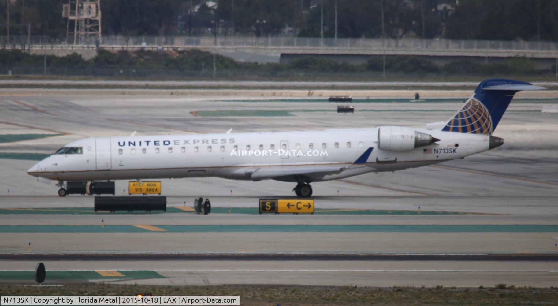 N713SK, 2004 Bombardier CRJ-701ER (CL-600-2C10) Regional Jet C/N 10174, United Express